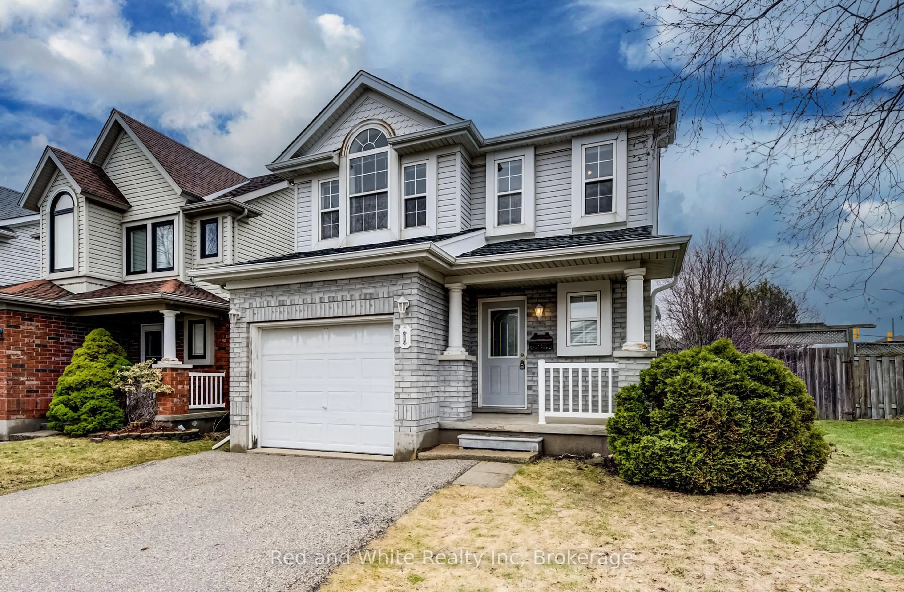 Home with vinyl exterior material, street for 1 Ginger Crt, Guelph Ontario N1G 4Z9