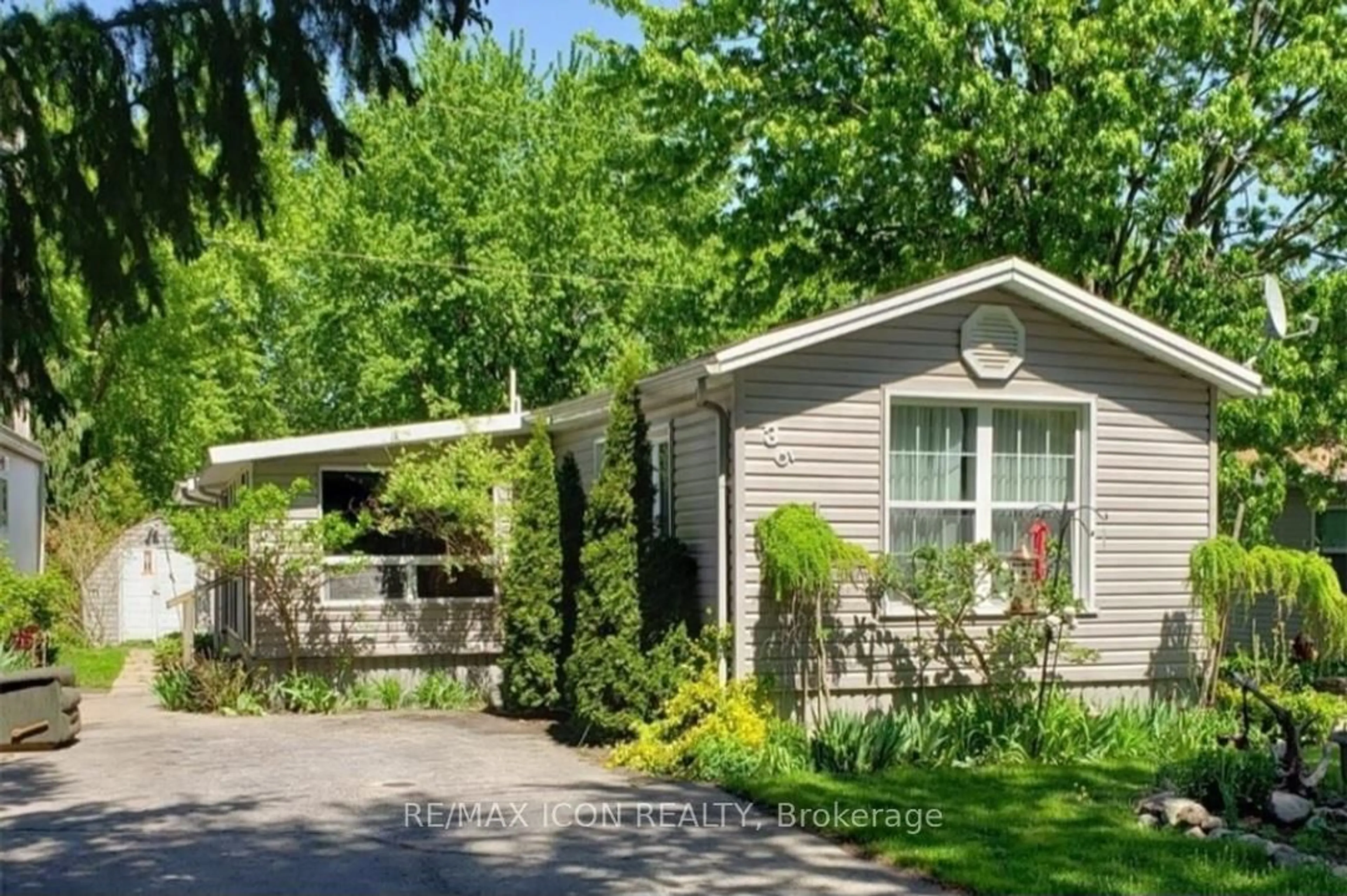 Home with vinyl exterior material, street for 9839 Lakeshore Rd #35, Lambton Shores Ontario N0M 1T0