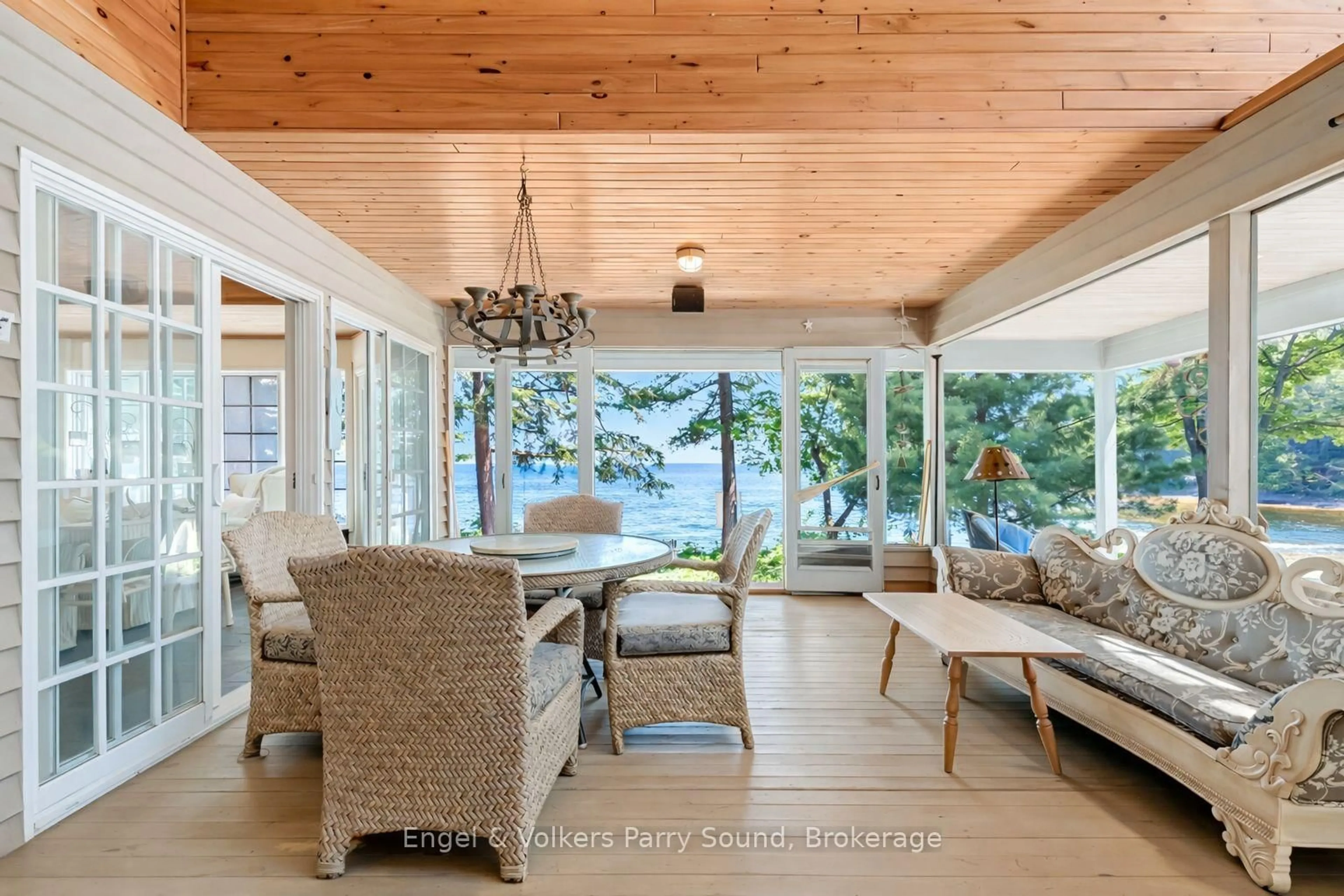 Living room with furniture, wood/laminate floor for 6 29C Mowat Island, Carling Ontario P0G 1G0