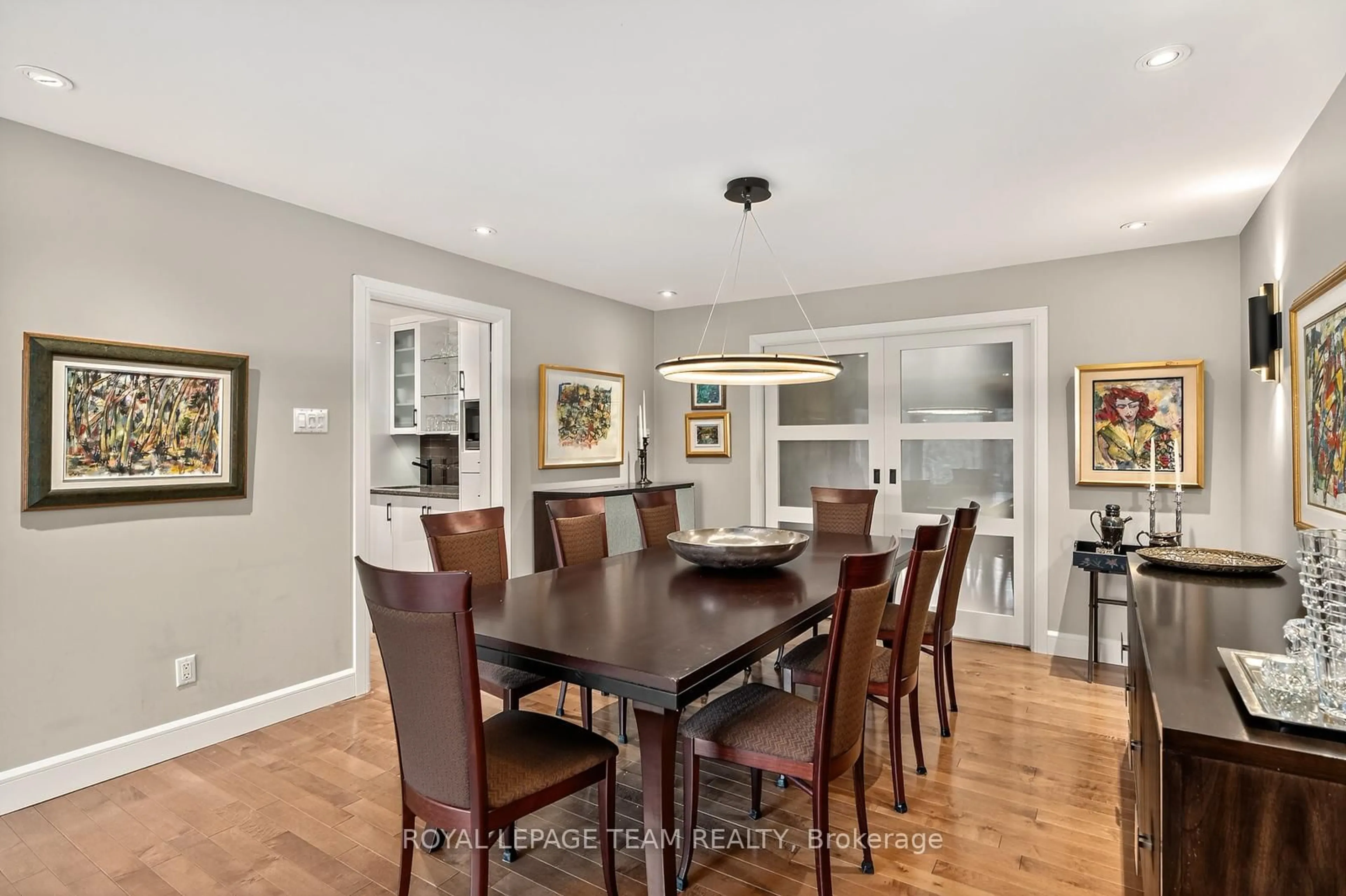 Dining room, wood/laminate floor for 55 Whitemarl Dr #Unit 10, Ottawa Ontario K1L 8J9