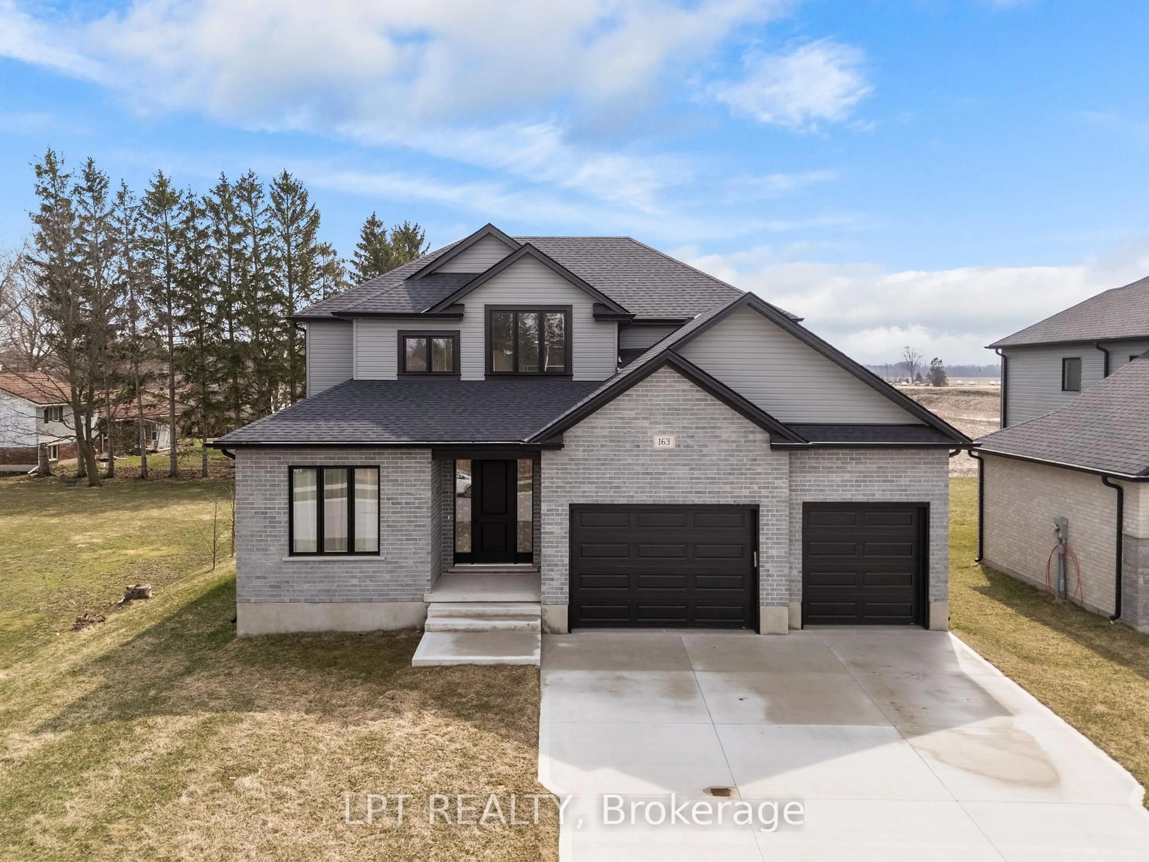 Home with brick exterior material, street for 163 Mcleod St, North Middlesex Ontario N0M 2K0