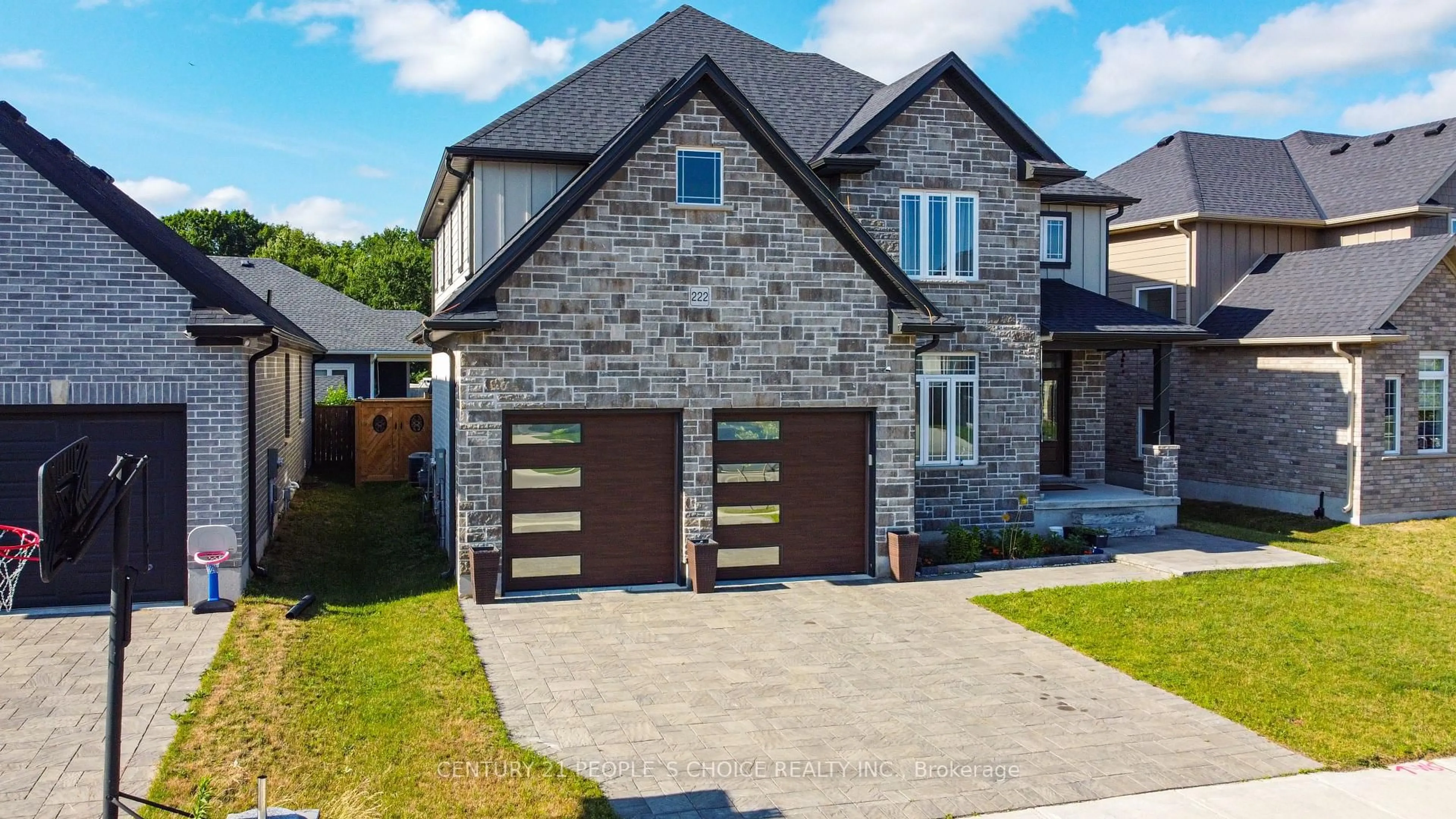 Home with brick exterior material, street for 222 Boardwalk Way, Thames Centre Ontario N0L 1G2