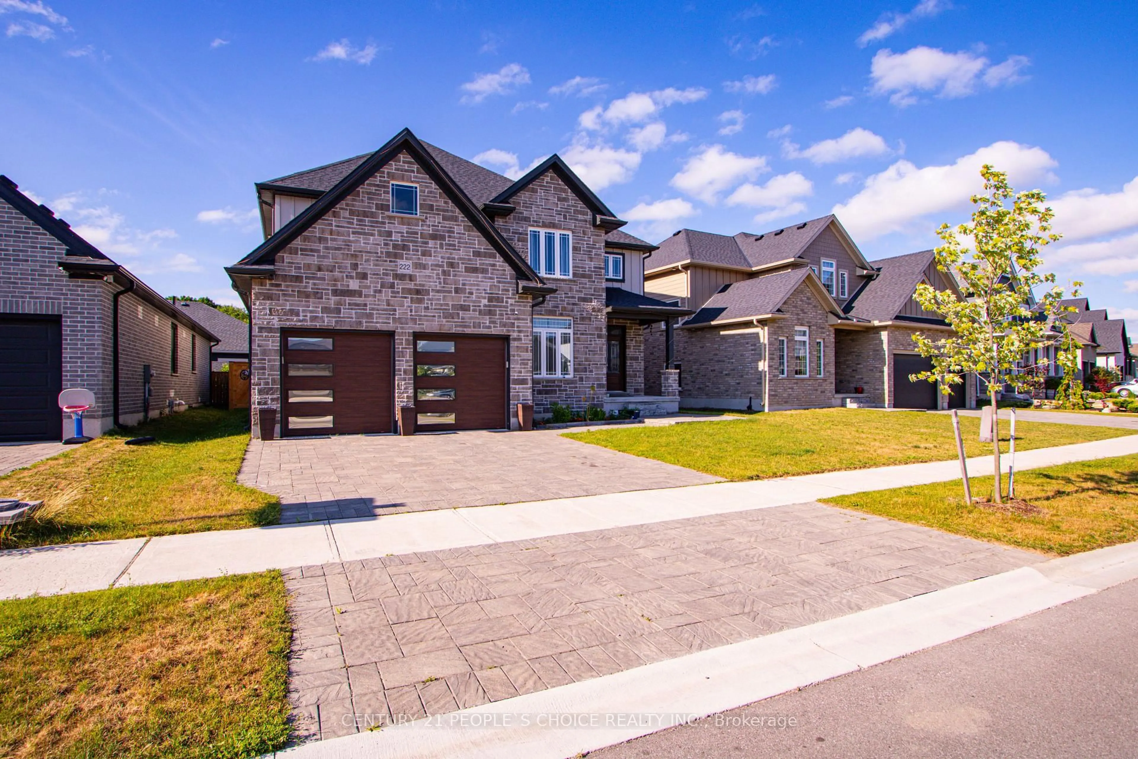 Home with brick exterior material, street for 222 Boardwalk Way, Thames Centre Ontario N0L 1G2