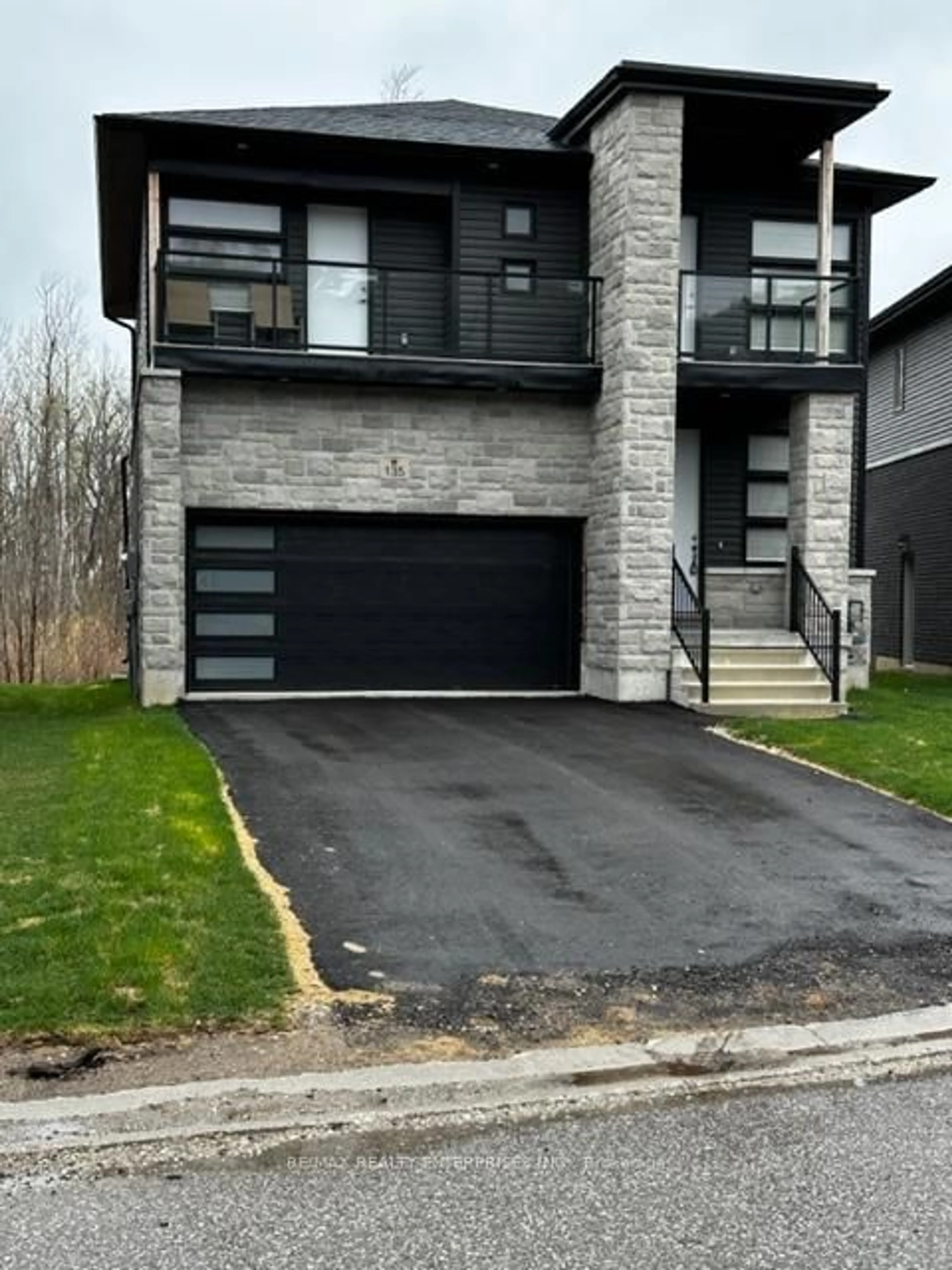 Home with brick exterior material, street for 135 Rosie St, Blue Mountains Ontario N0H 1J0