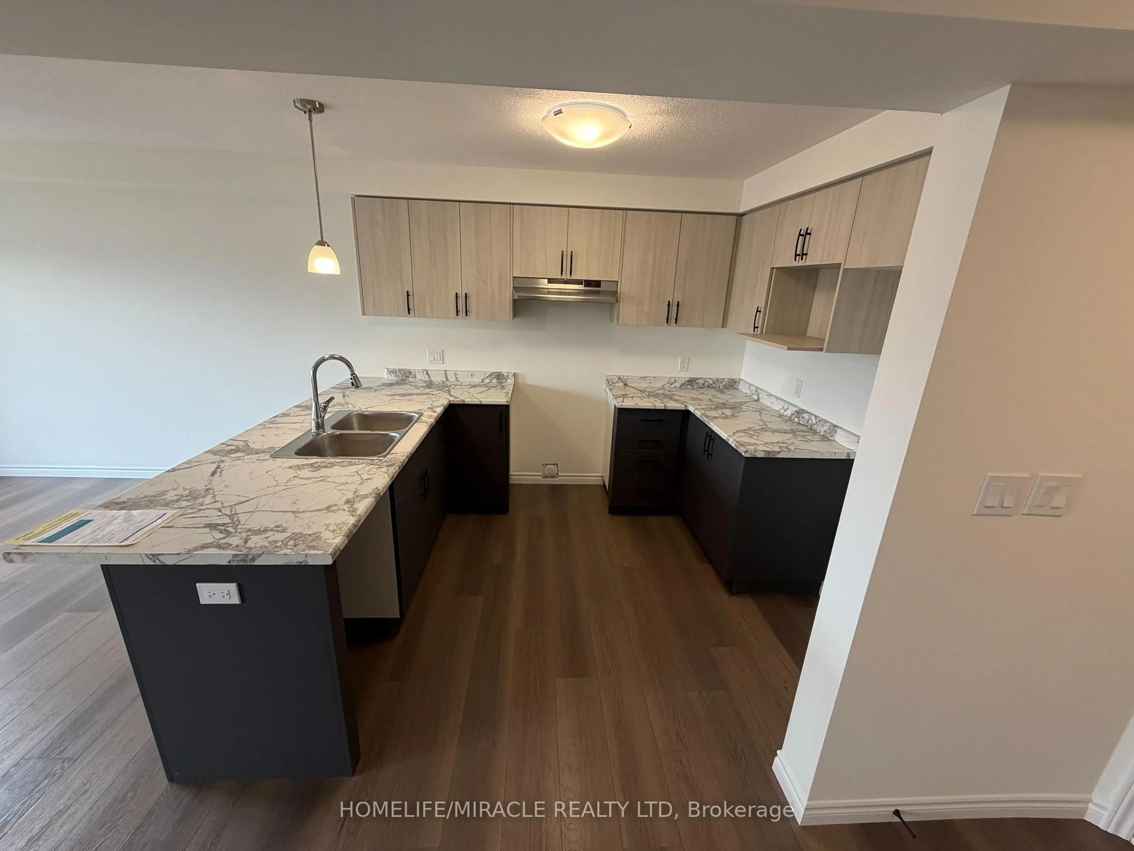 Open concept kitchen, unknown for 115 Mattingley St, Brant Ontario N3L 2M2