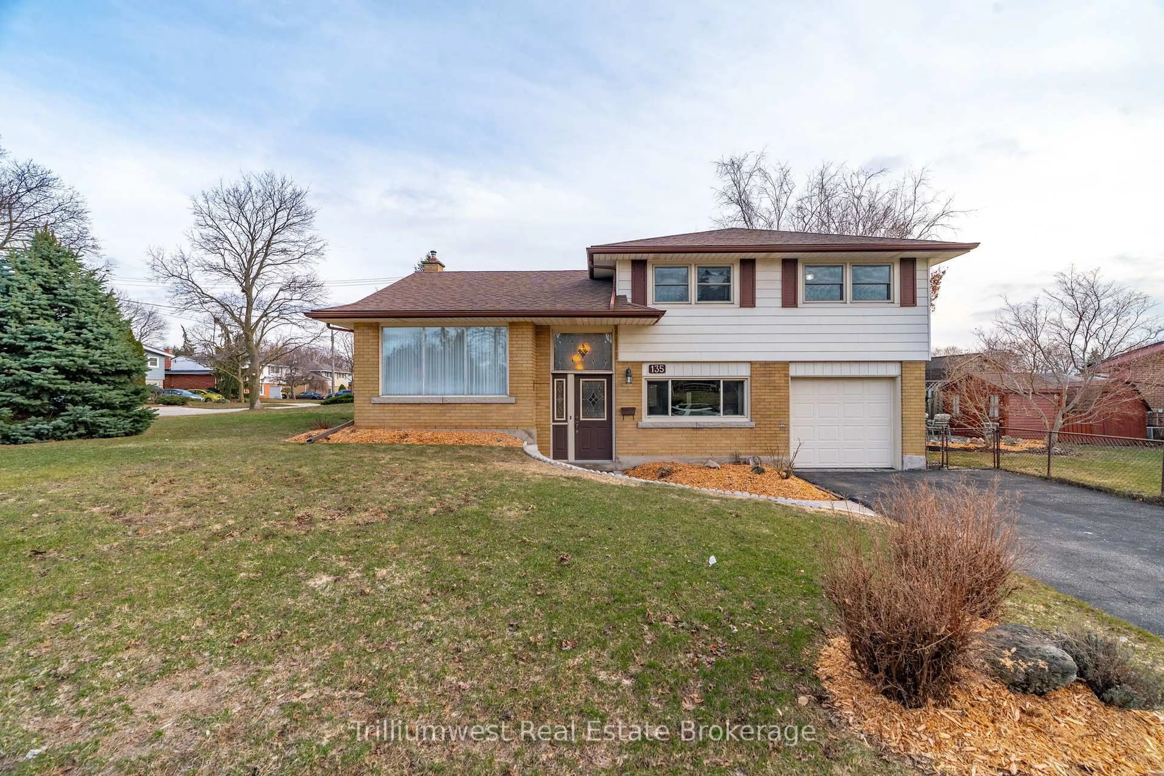 Home with brick exterior material, street for 135 Burbank Rd, Kitchener Ontario N2B 1E3