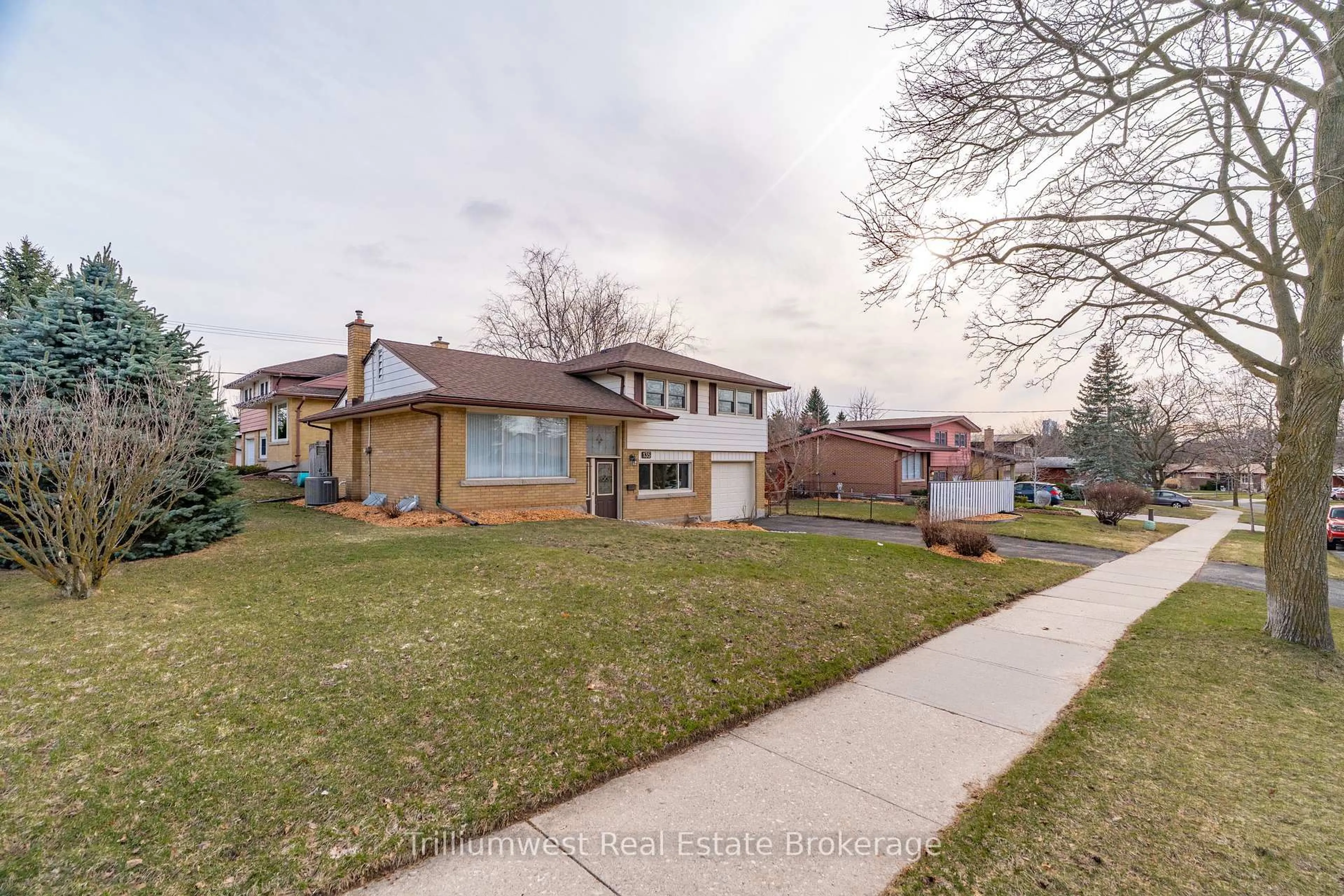 Home with brick exterior material, street for 135 Burbank Rd, Kitchener Ontario N2B 1E3