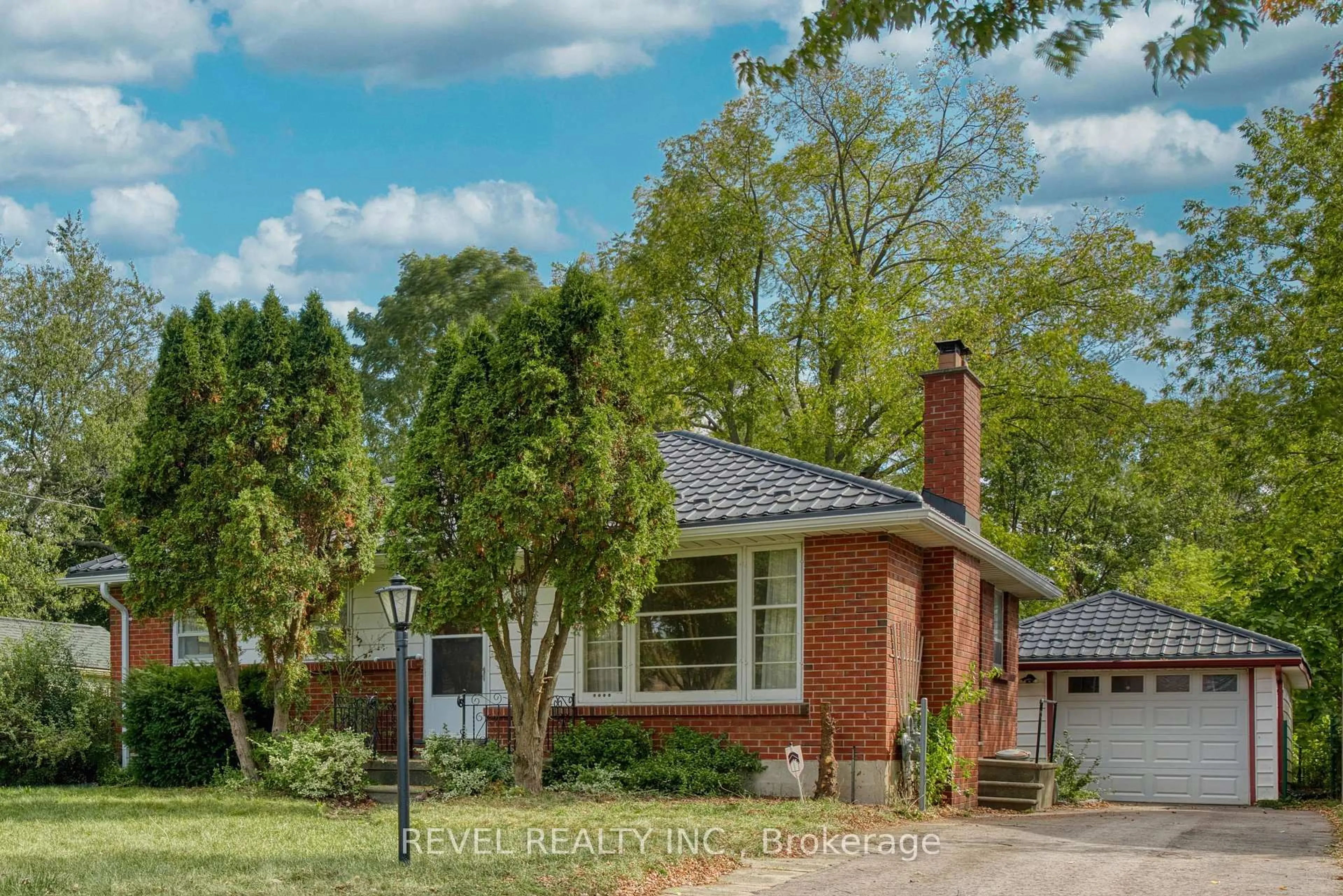 Home with brick exterior material, street for 143 Oakside St, London East Ontario N5Y 1E8