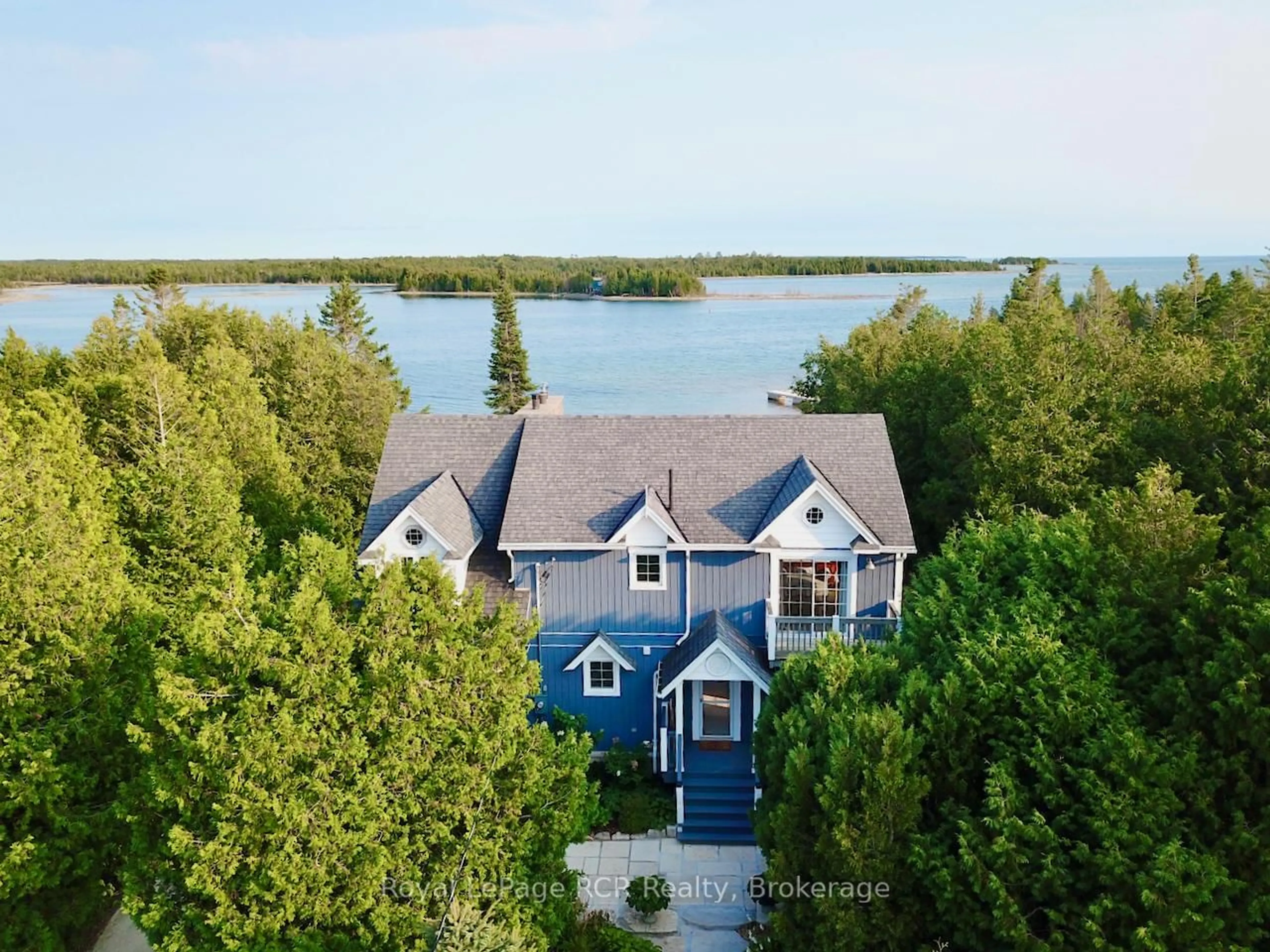 A pic from outside/outdoor area/front of a property/back of a property/a pic from drone, water/lake/river/ocean view for 127 Pine Tree Harbour Rd, Northern Bruce Peninsula Ontario N0H 1Z0