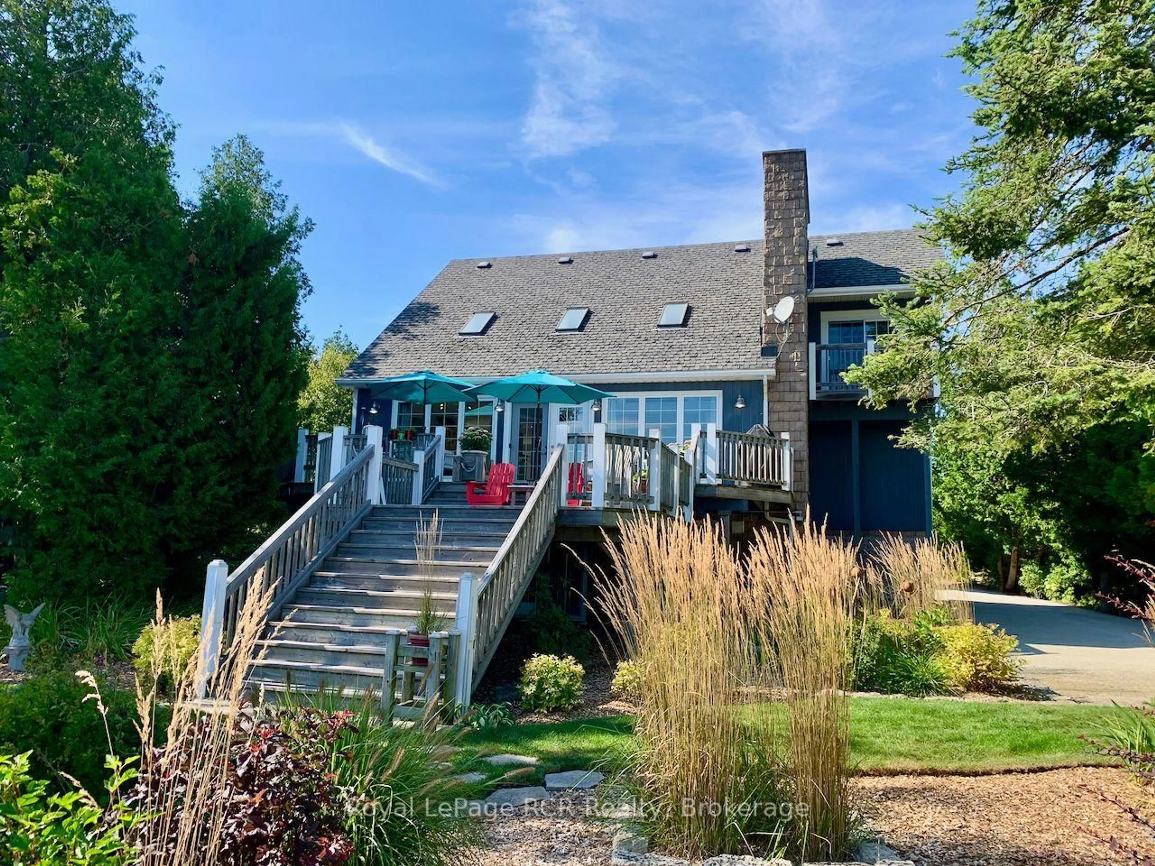 A pic from outside/outdoor area/front of a property/back of a property/a pic from drone, water/lake/river/ocean view for 127 Pine Tree Harbour Rd, Northern Bruce Peninsula Ontario N0H 1Z0