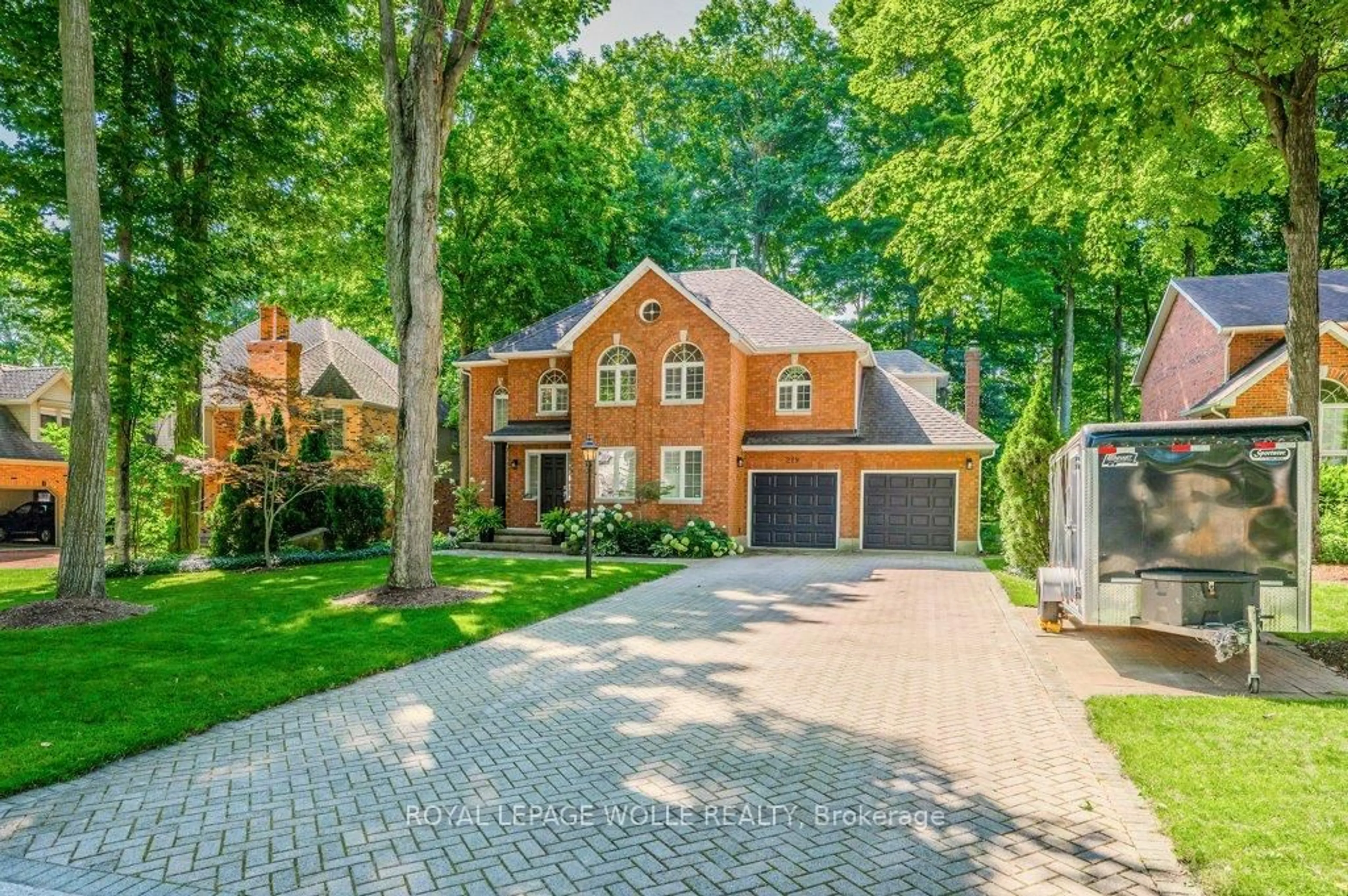 Home with brick exterior material, street for 219 Corrie Cres, Waterloo Ontario N2L 5W3