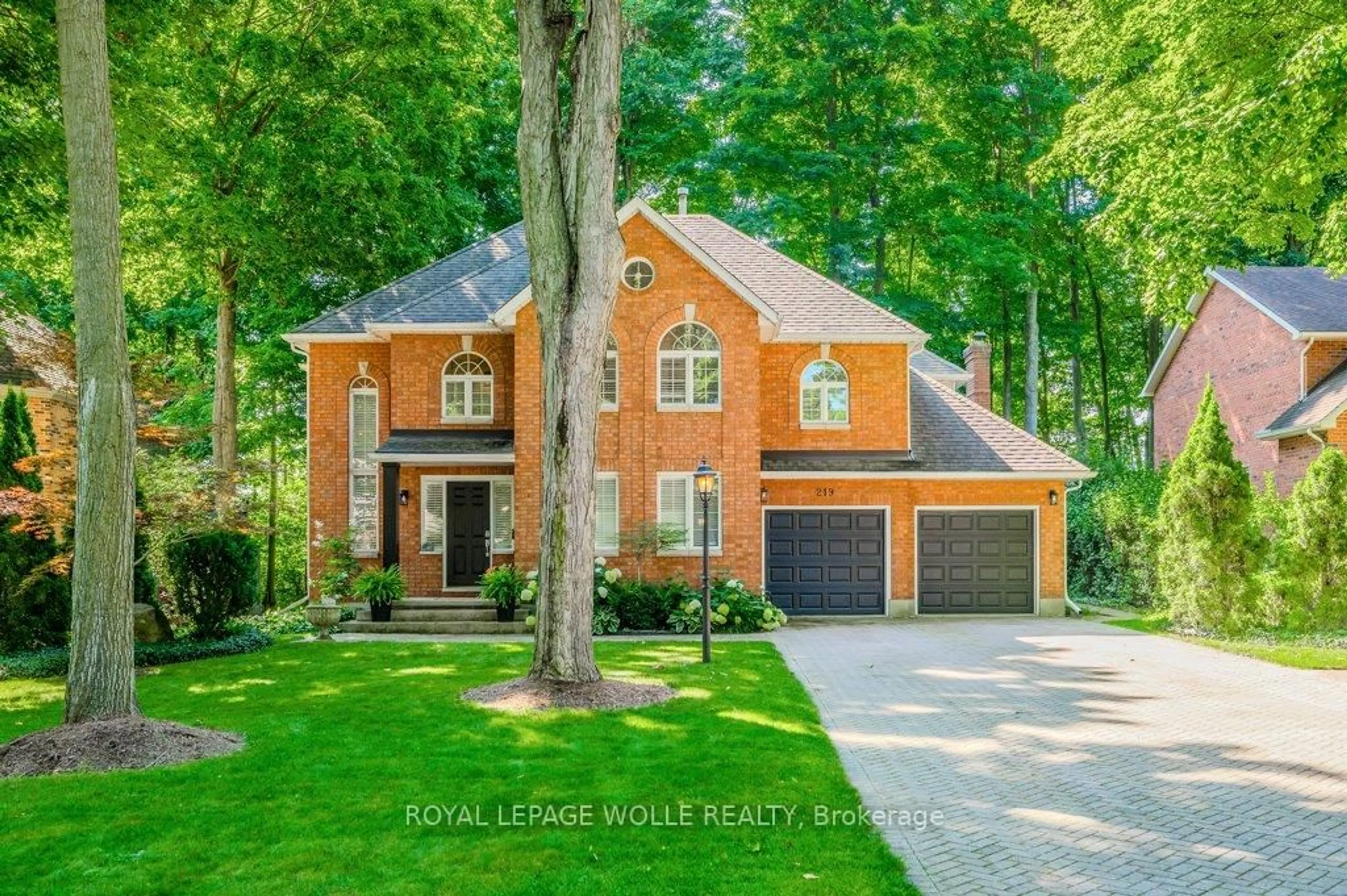 Home with brick exterior material, street for 219 Corrie Cres, Waterloo Ontario N2L 5W3