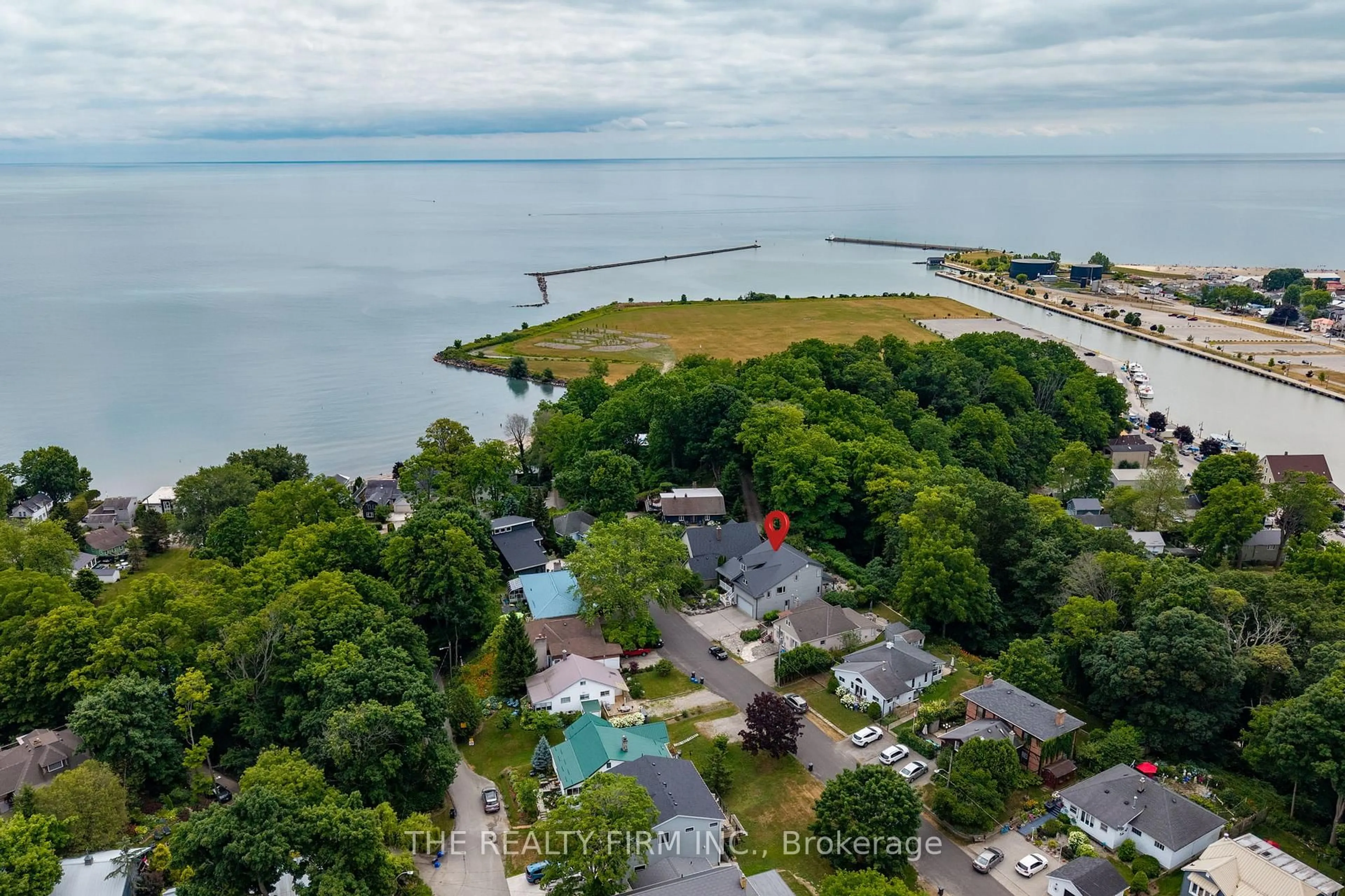 A pic from outside/outdoor area/front of a property/back of a property/a pic from drone, water/lake/river/ocean view for 210 Cornell Dr, Central Elgin Ontario N5L 1A5