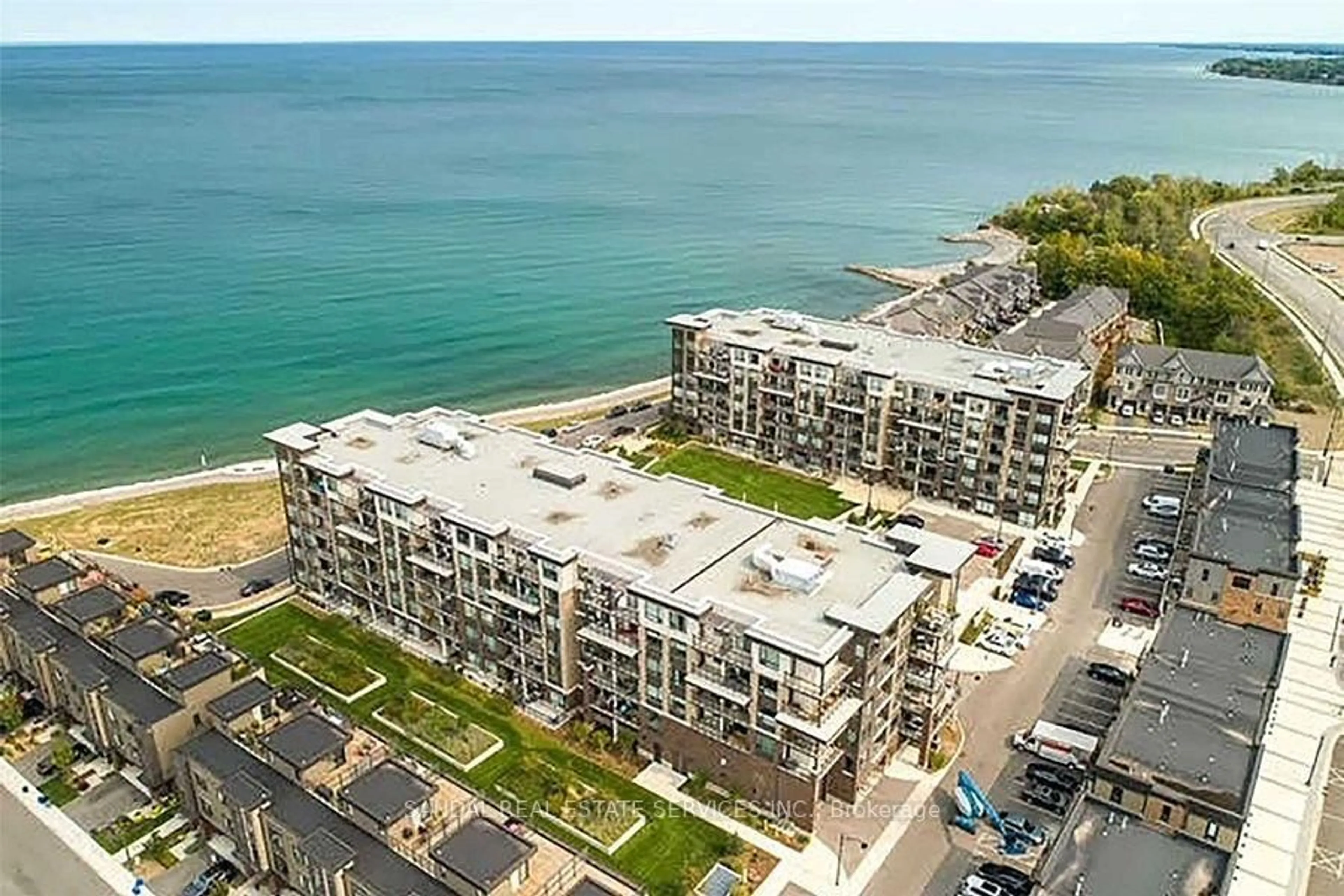 A pic from outside/outdoor area/front of a property/back of a property/a pic from drone, water/lake/river/ocean view for 40 Esplanade Lane #315, Grimsby Ontario L3M 0G9