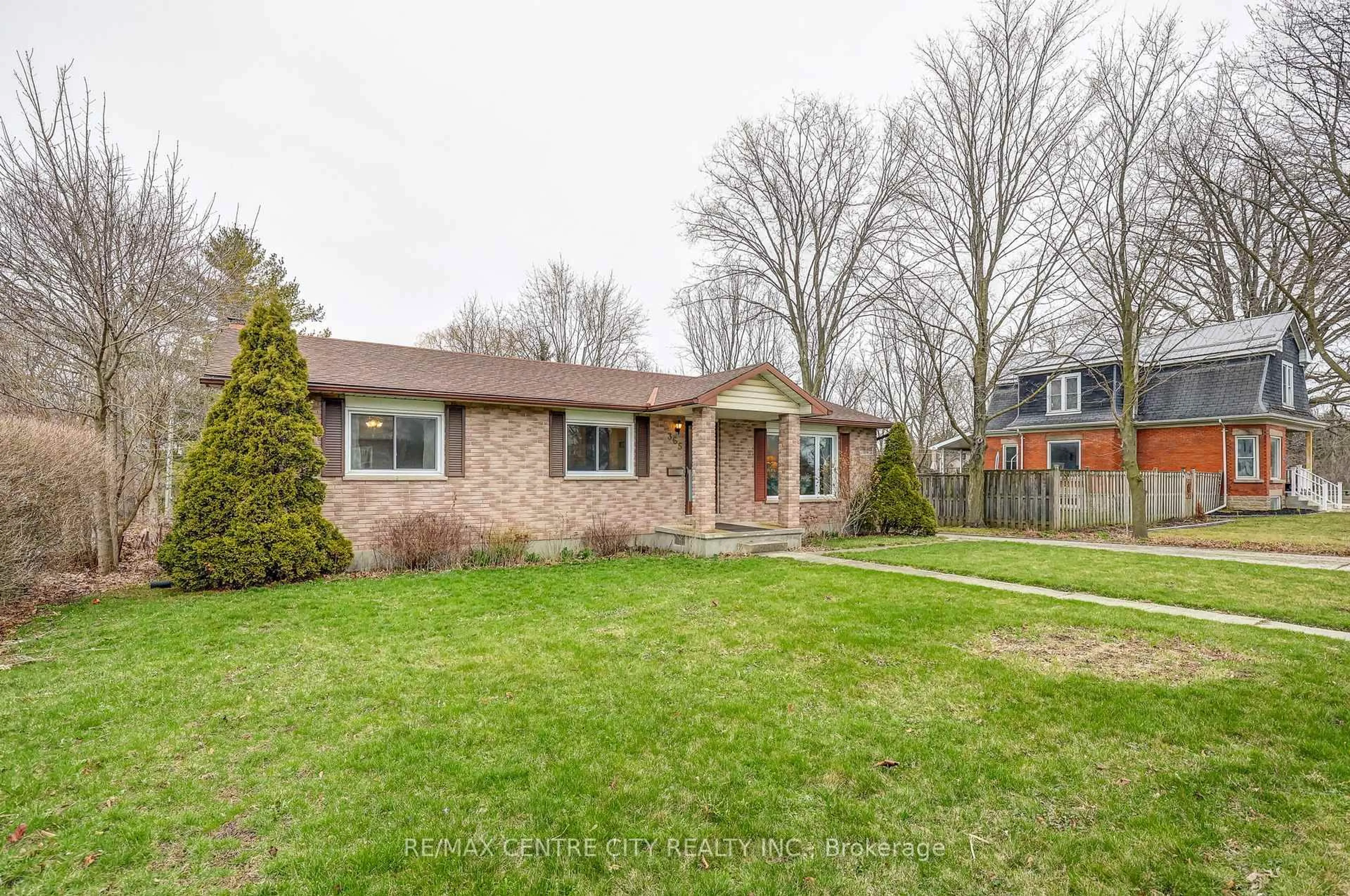 Home with brick exterior material, street for 365 Talbot St, Aylmer Ontario N5H 1J1
