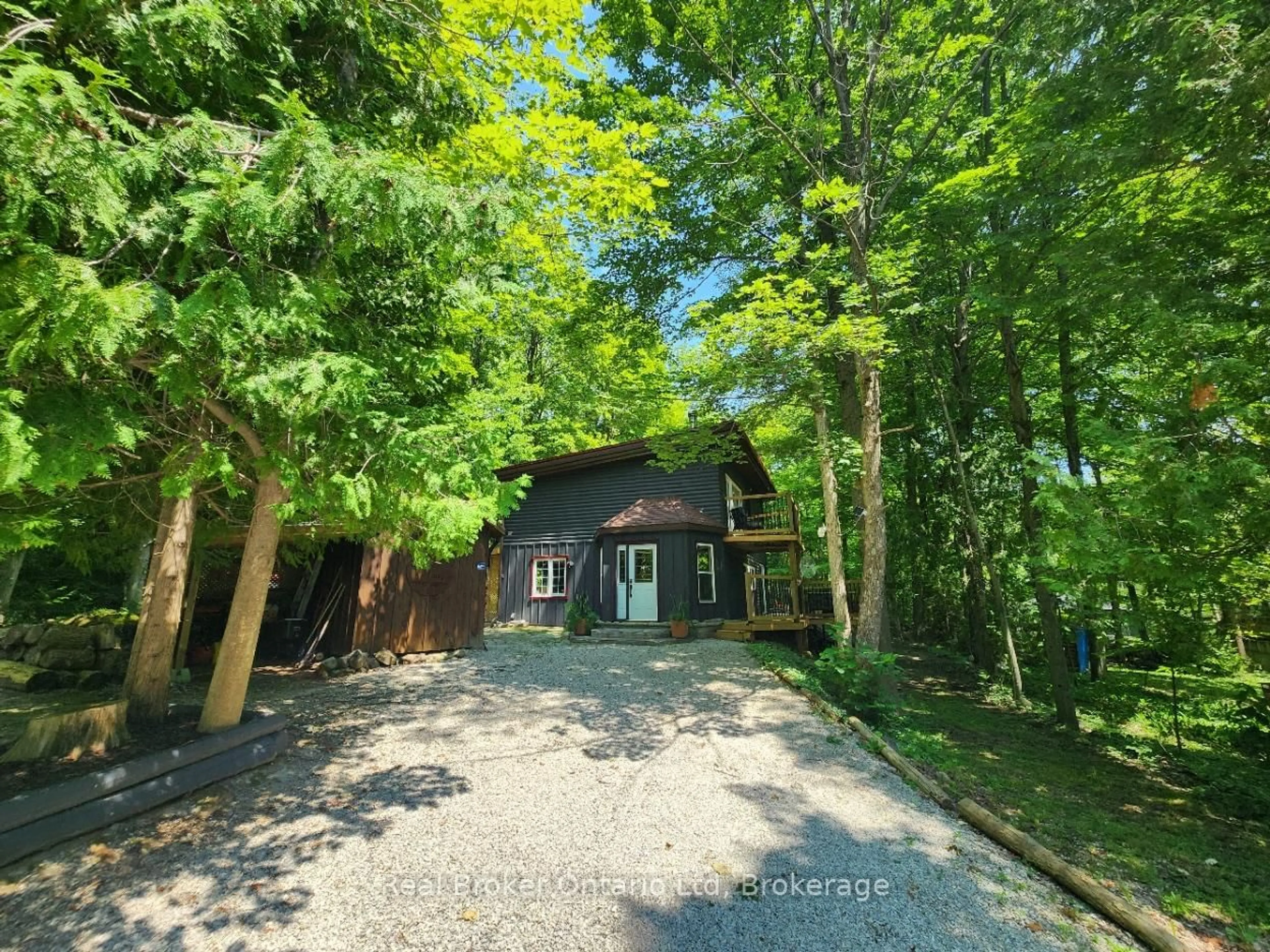 A pic from outside/outdoor area/front of a property/back of a property/a pic from drone, forest/trees view for 12 7th Ave, South Bruce Peninsula Ontario N0H 2T0