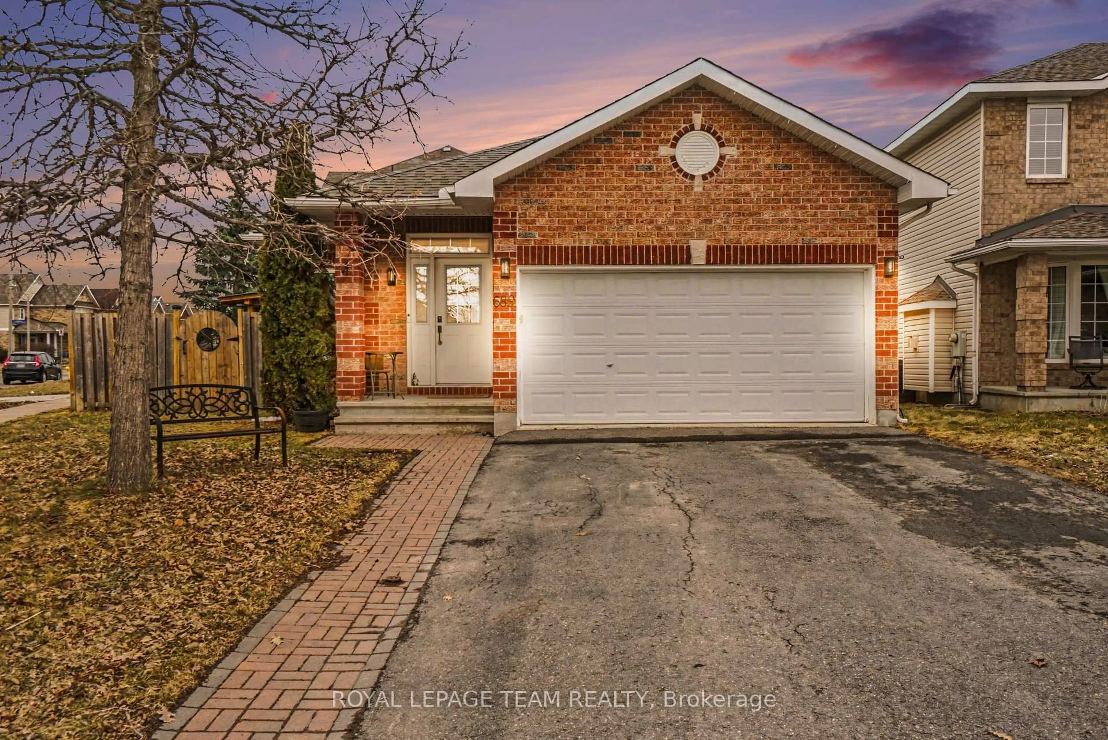 Home with brick exterior material, street for 689 Vermillion Dr, Gloucester Ontario K1V 1W2