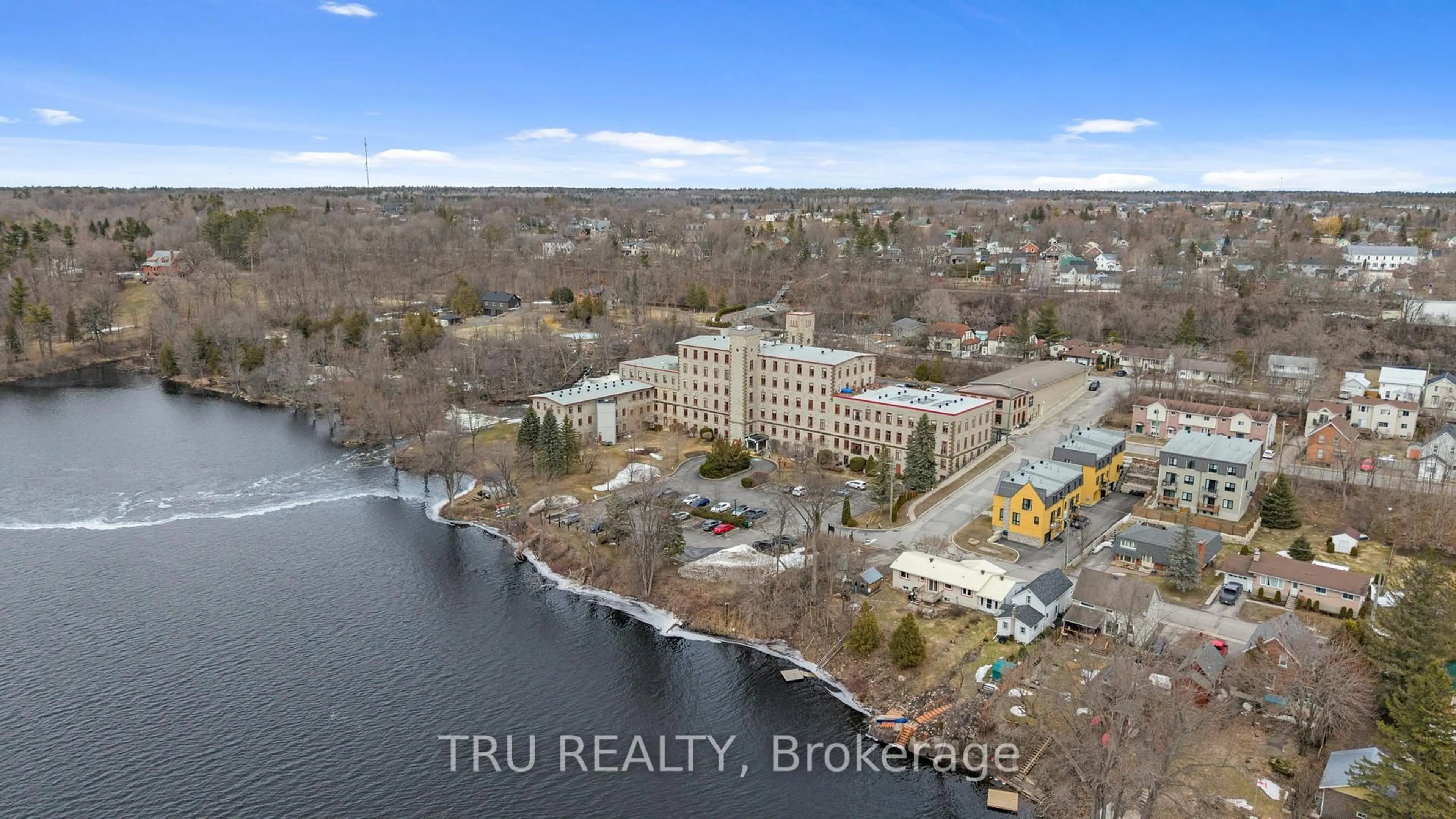 A pic from outside/outdoor area/front of a property/back of a property/a pic from drone, water/lake/river/ocean view for 1 Rosamond St #308, Almonte Ontario K0A 1A0