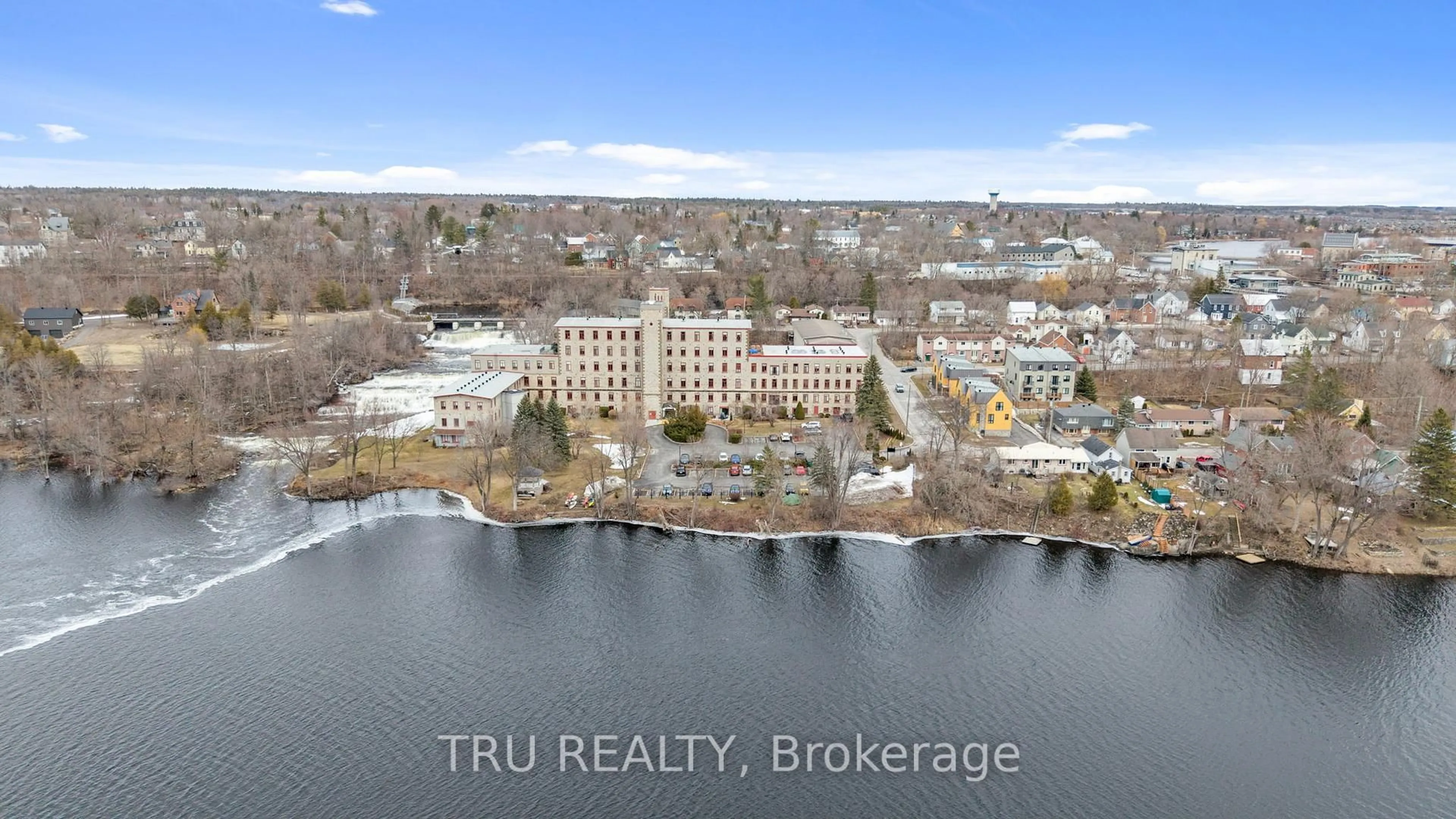 A pic from outside/outdoor area/front of a property/back of a property/a pic from drone, water/lake/river/ocean view for 1 Rosamond St #308, Almonte Ontario K0A 1A0