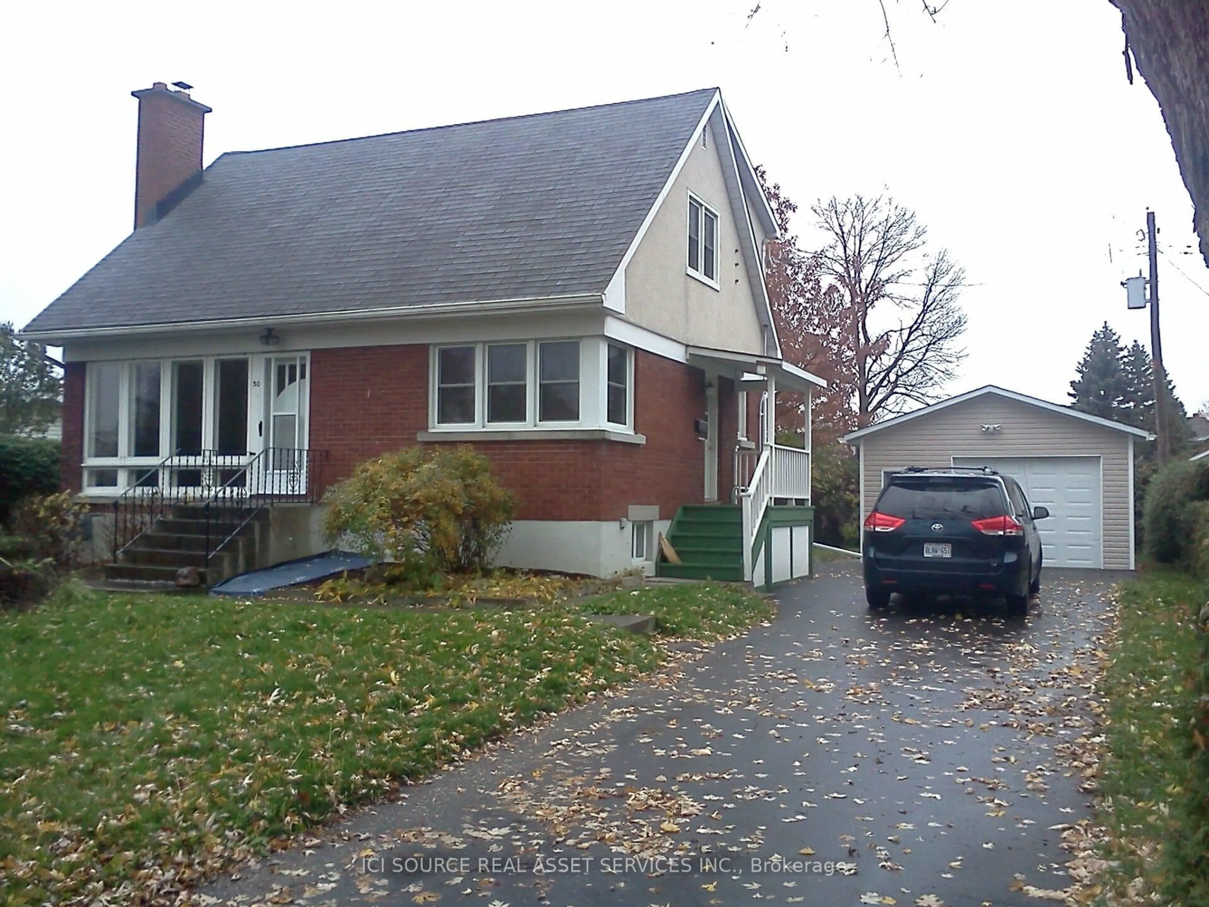 Home with vinyl exterior material, street for 30 Sunnycrest Dr, Ottawa Ontario K2E 5Y2