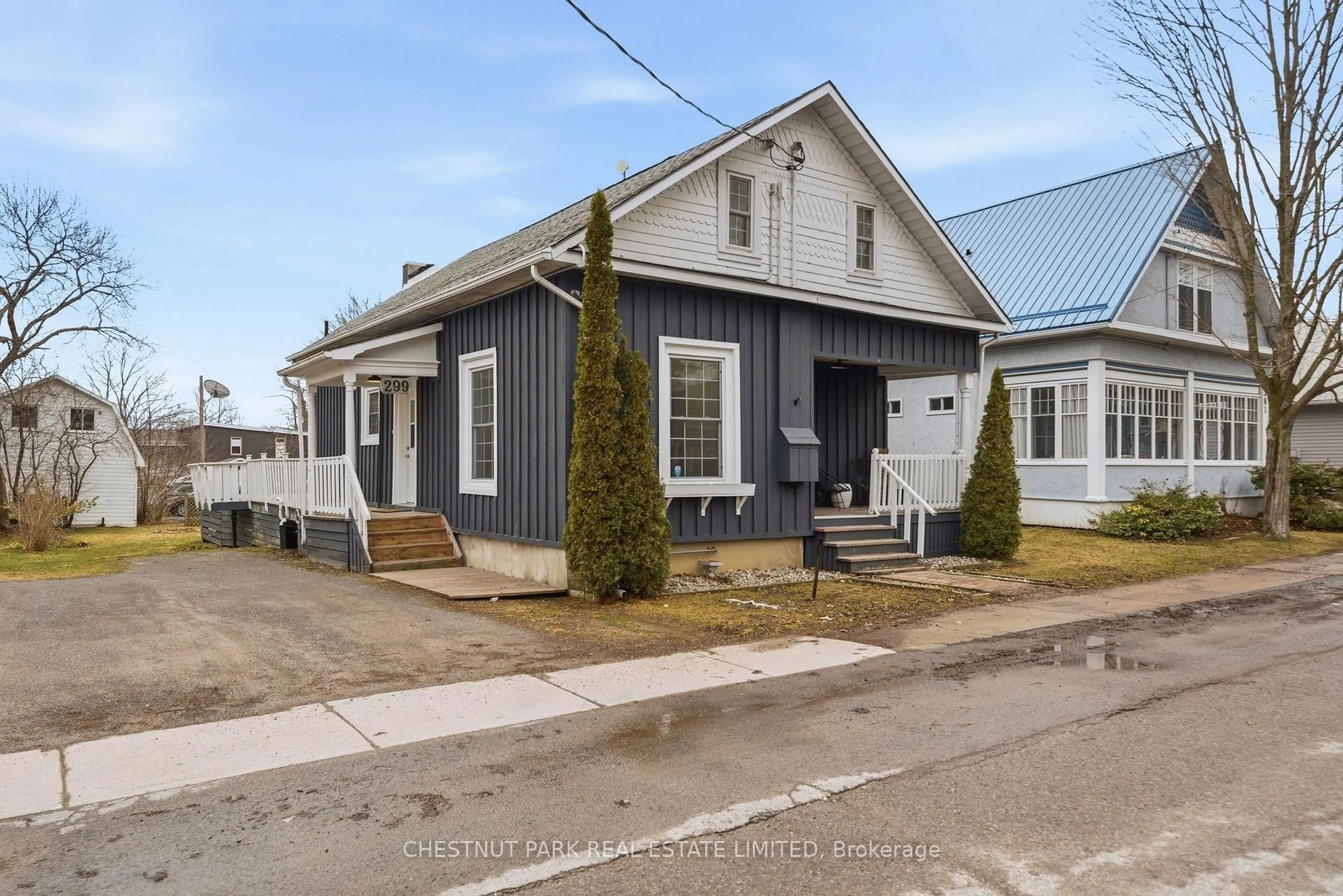 Home with vinyl exterior material, street for 299 Noxon Ave, Prince Edward County Ontario K0K 3L0