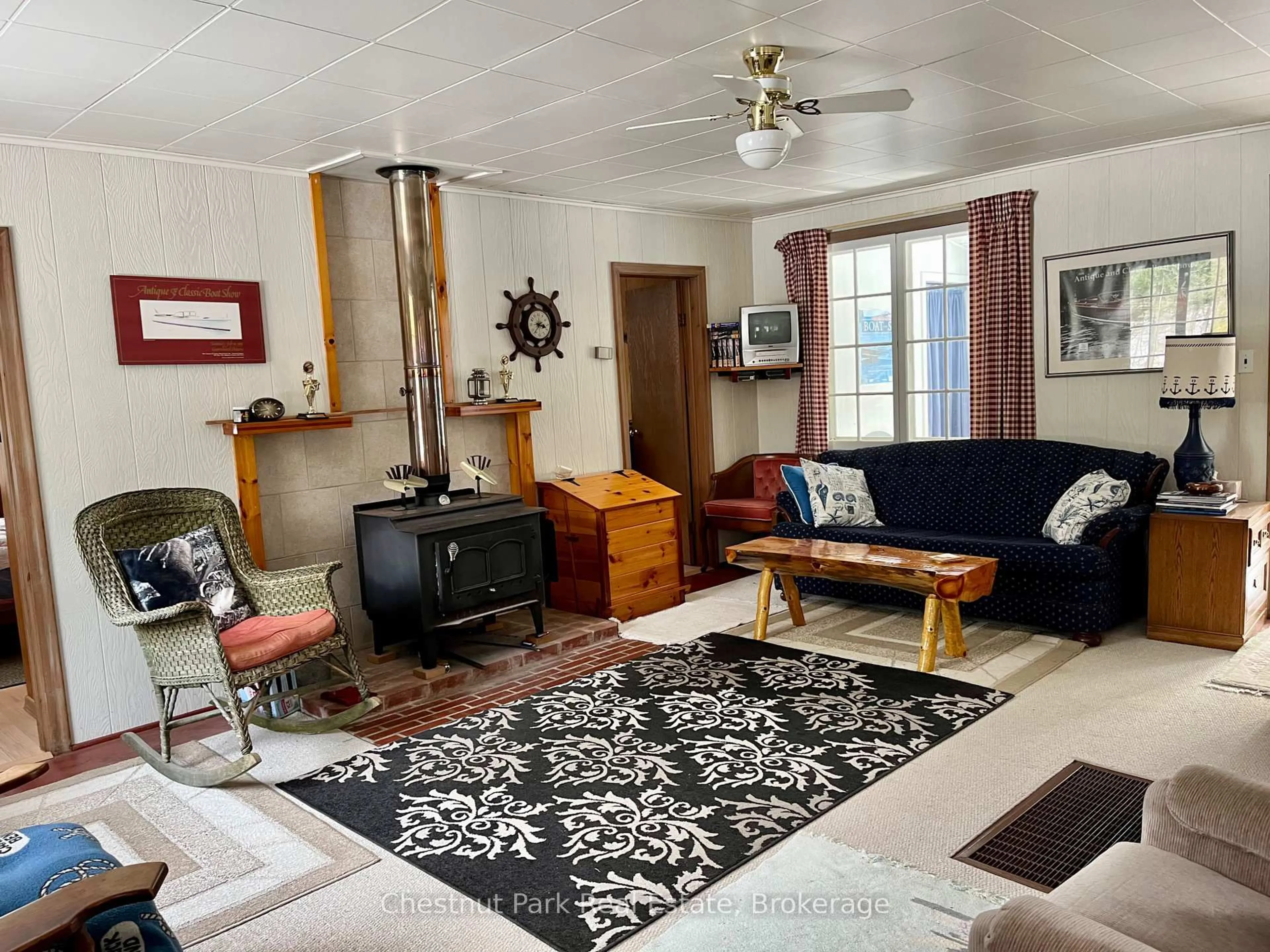 Living room with furniture, unknown for 34 Harris St, Muskoka Lakes Ontario P0B 1J0