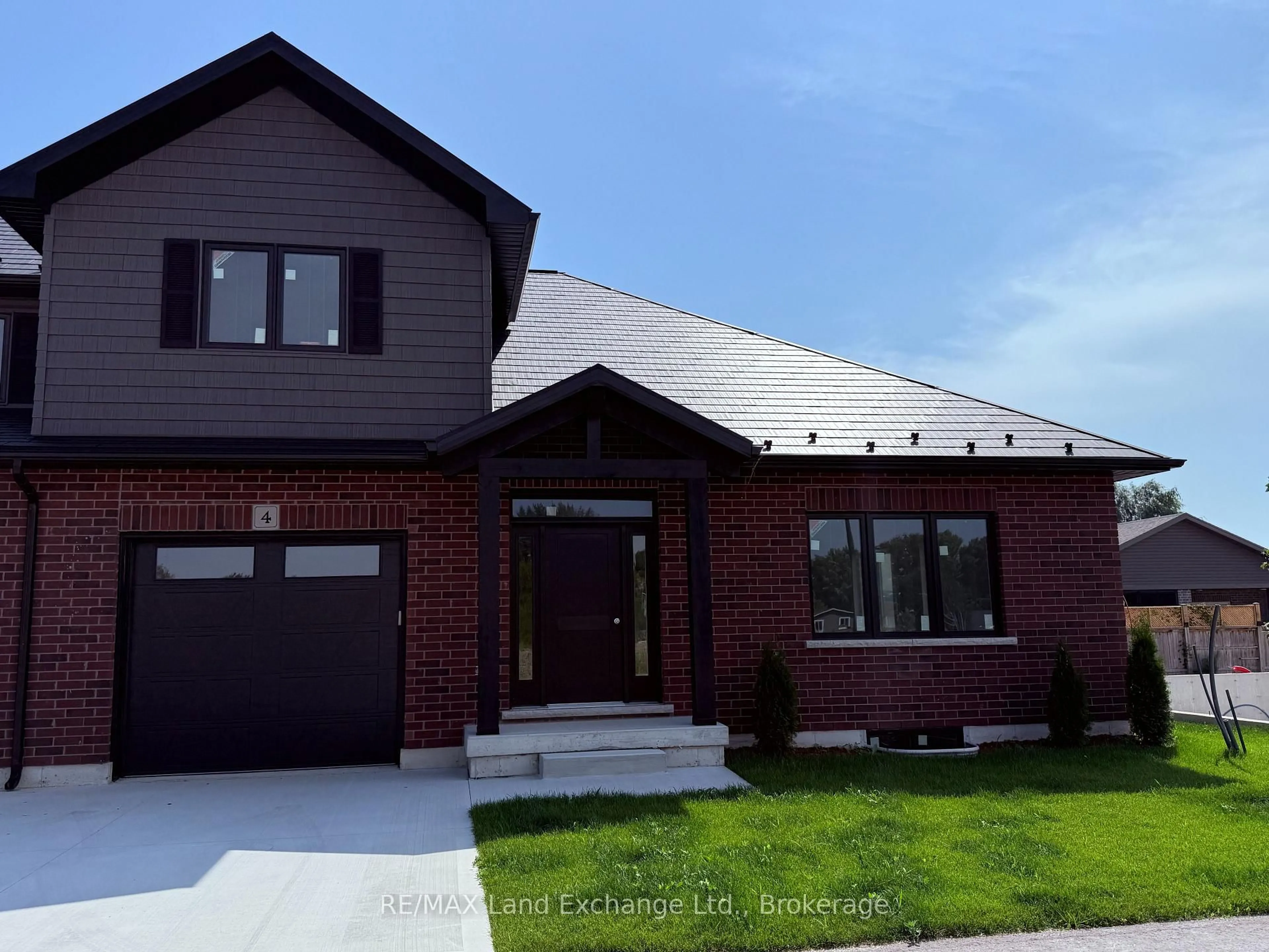 Home with brick exterior material, street for 8 GOLF LINKS Rd #Unit 4, Kincardine Ontario N2Z 0G1