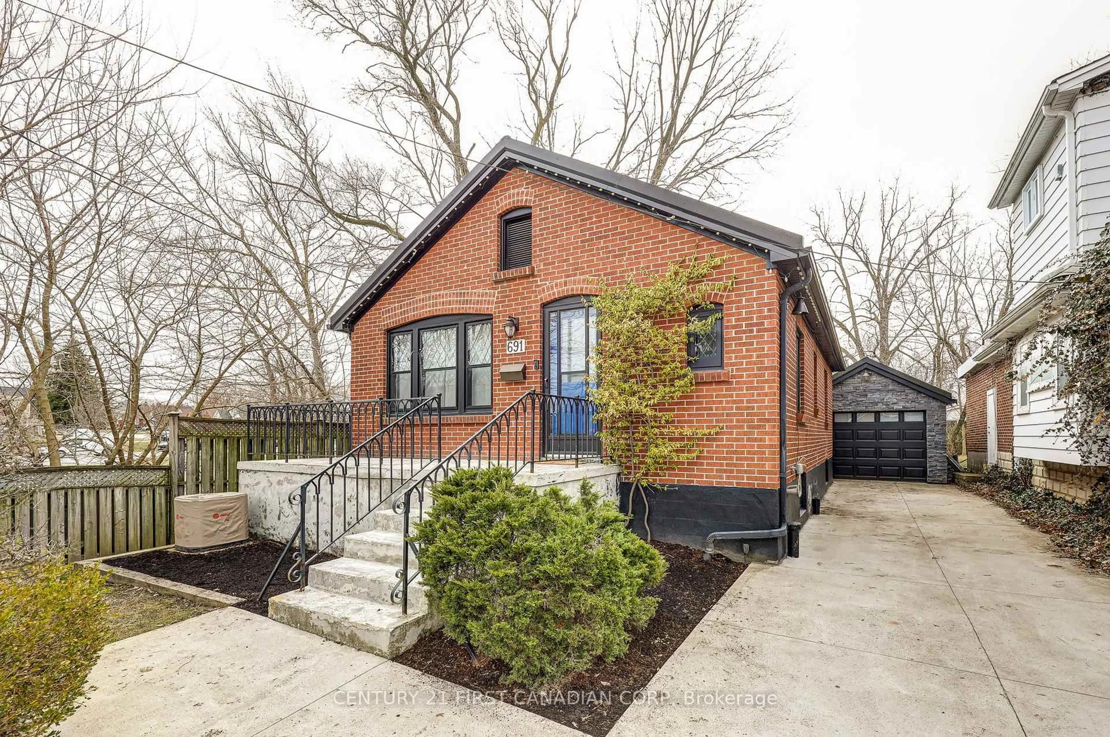 Home with brick exterior material, street for 691 EMERY St, London South Ontario N6C 2G3
