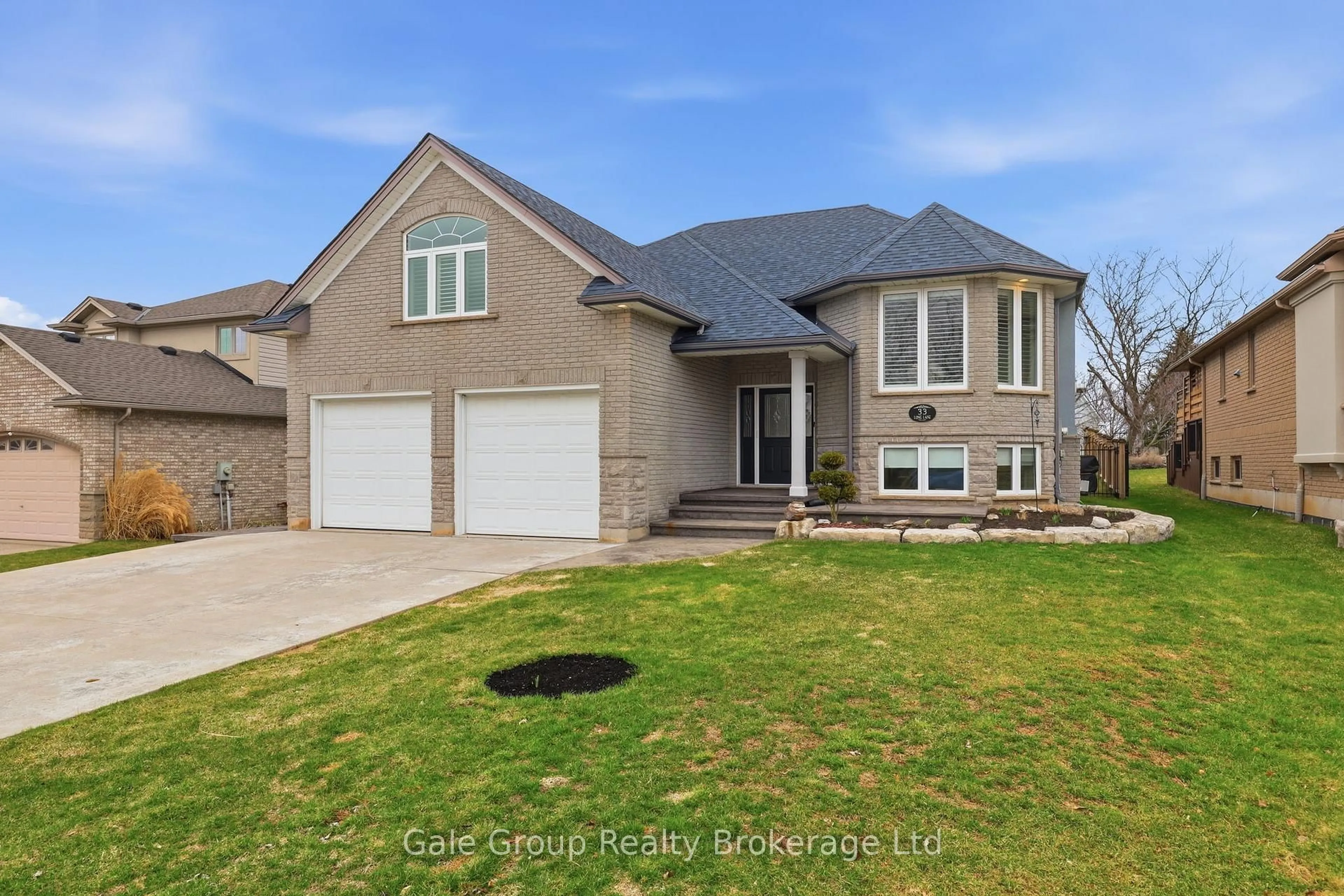 Home with brick exterior material, street for 33 Long Lane, Brant Ontario N3L 4E9