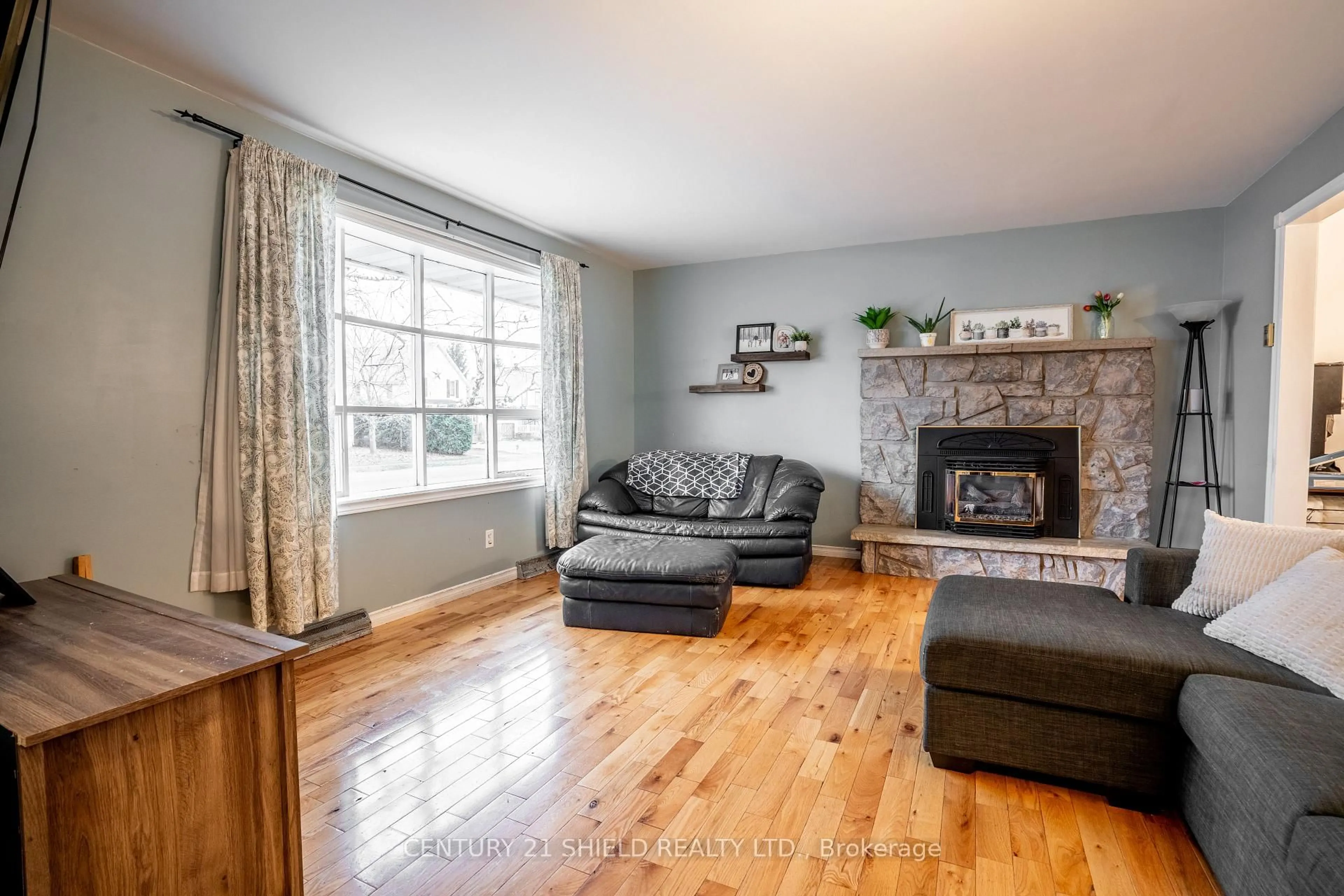 Living room with furniture, wood/laminate floor for 11 Strachan Ave, South Stormont Ontario K0C 1P0
