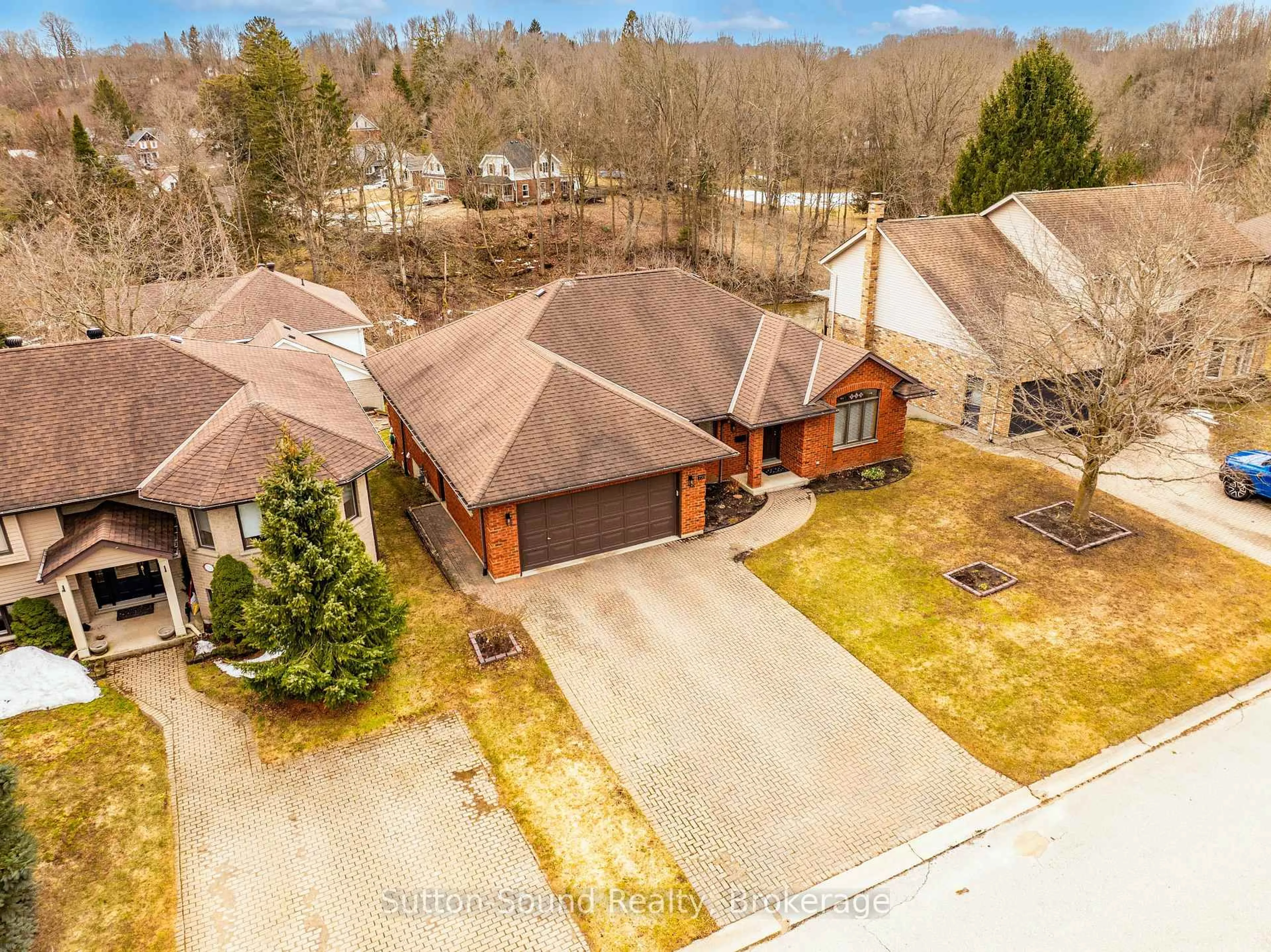A pic from outside/outdoor area/front of a property/back of a property/a pic from drone, street for 735 15th A St, Owen Sound Ontario N4K 6V7