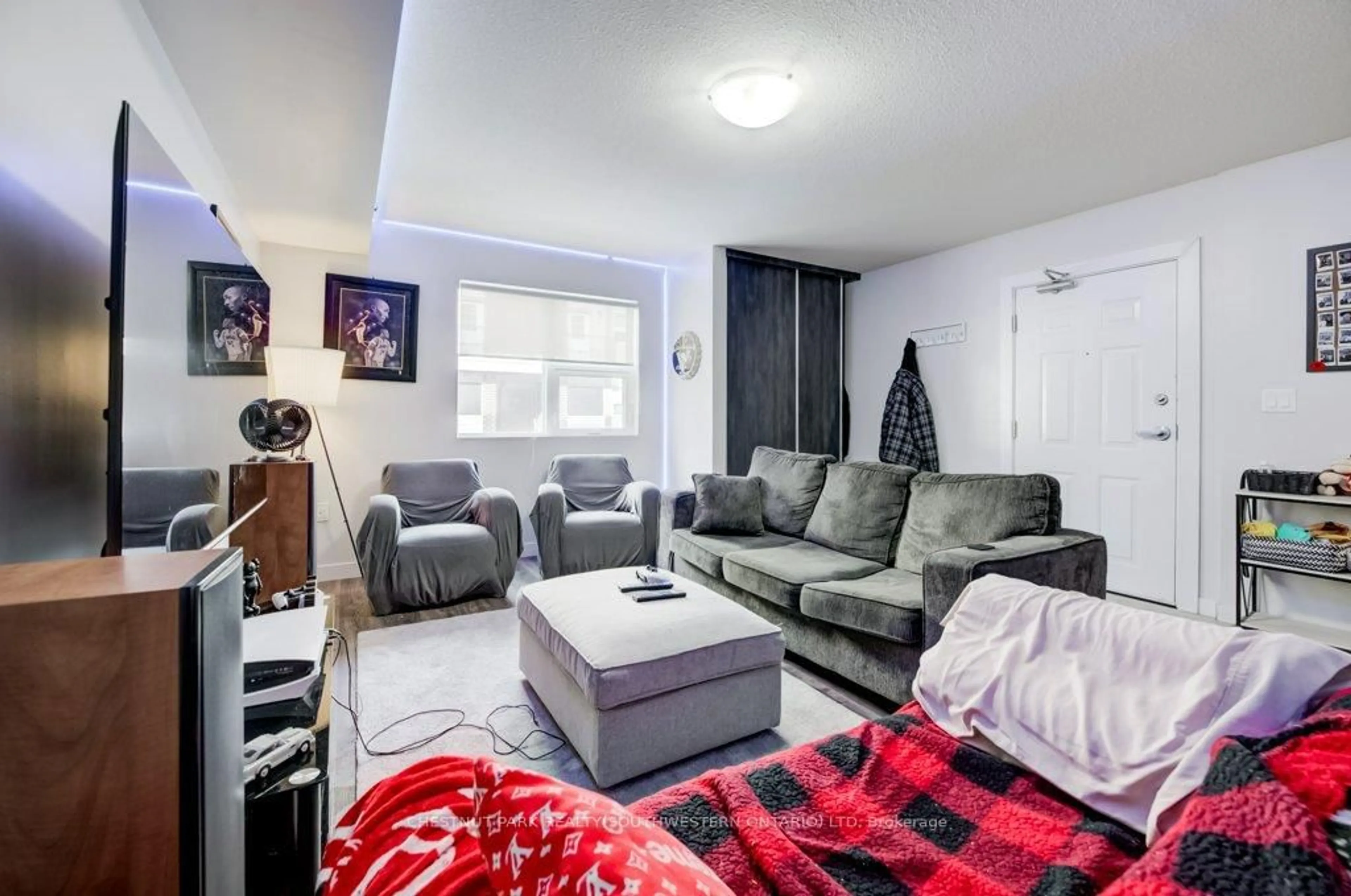 Living room with furniture, unknown for 338 Albert St #114, Waterloo Ontario N2L 3T8