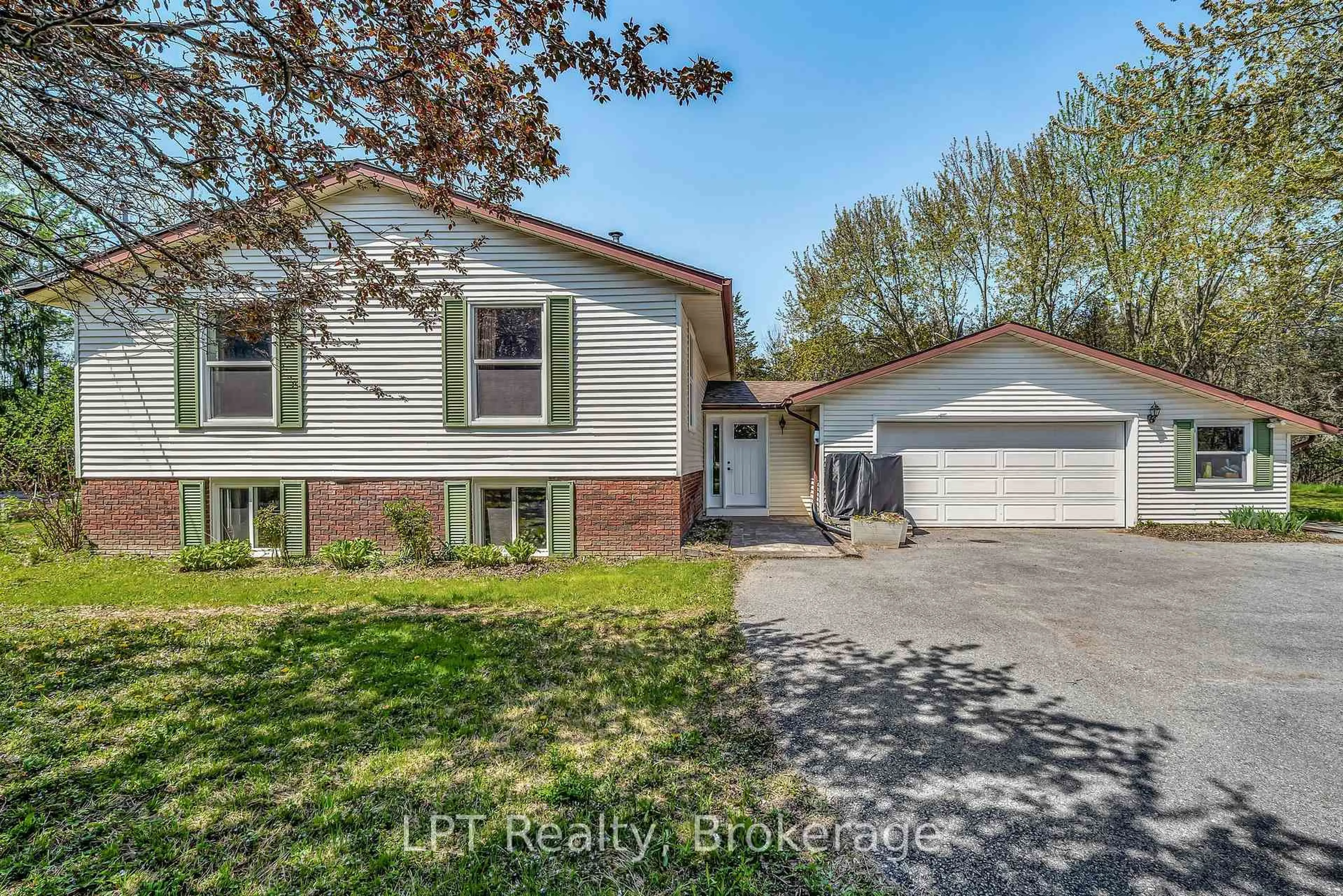 Home with vinyl exterior material, street for 1207 County Rd 9 St, Napanee Ontario K7R 3K8