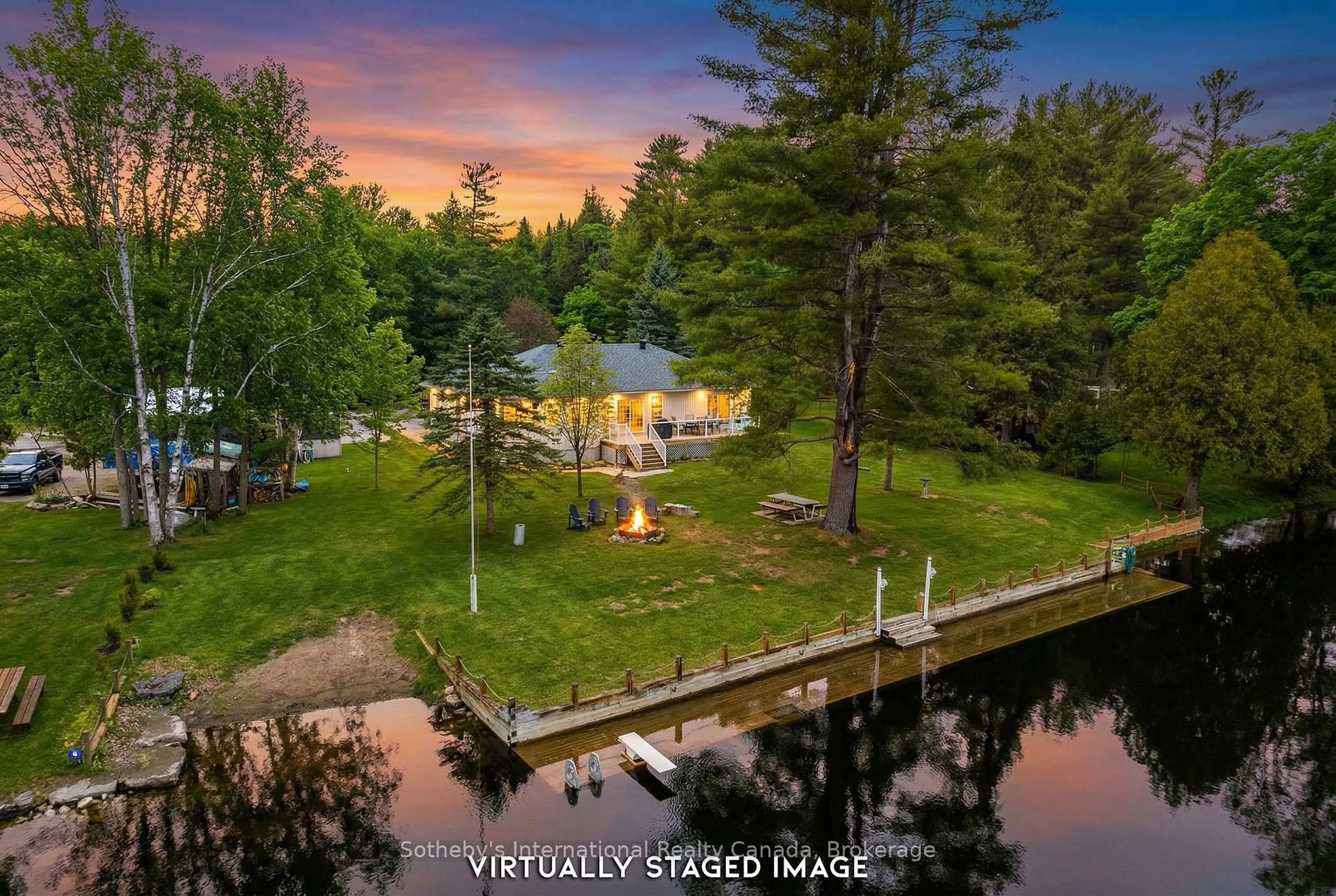 A pic from outside/outdoor area/front of a property/back of a property/a pic from drone, water/lake/river/ocean view for 1099 Davis Dr, Gravenhurst Ontario P0E 1N0