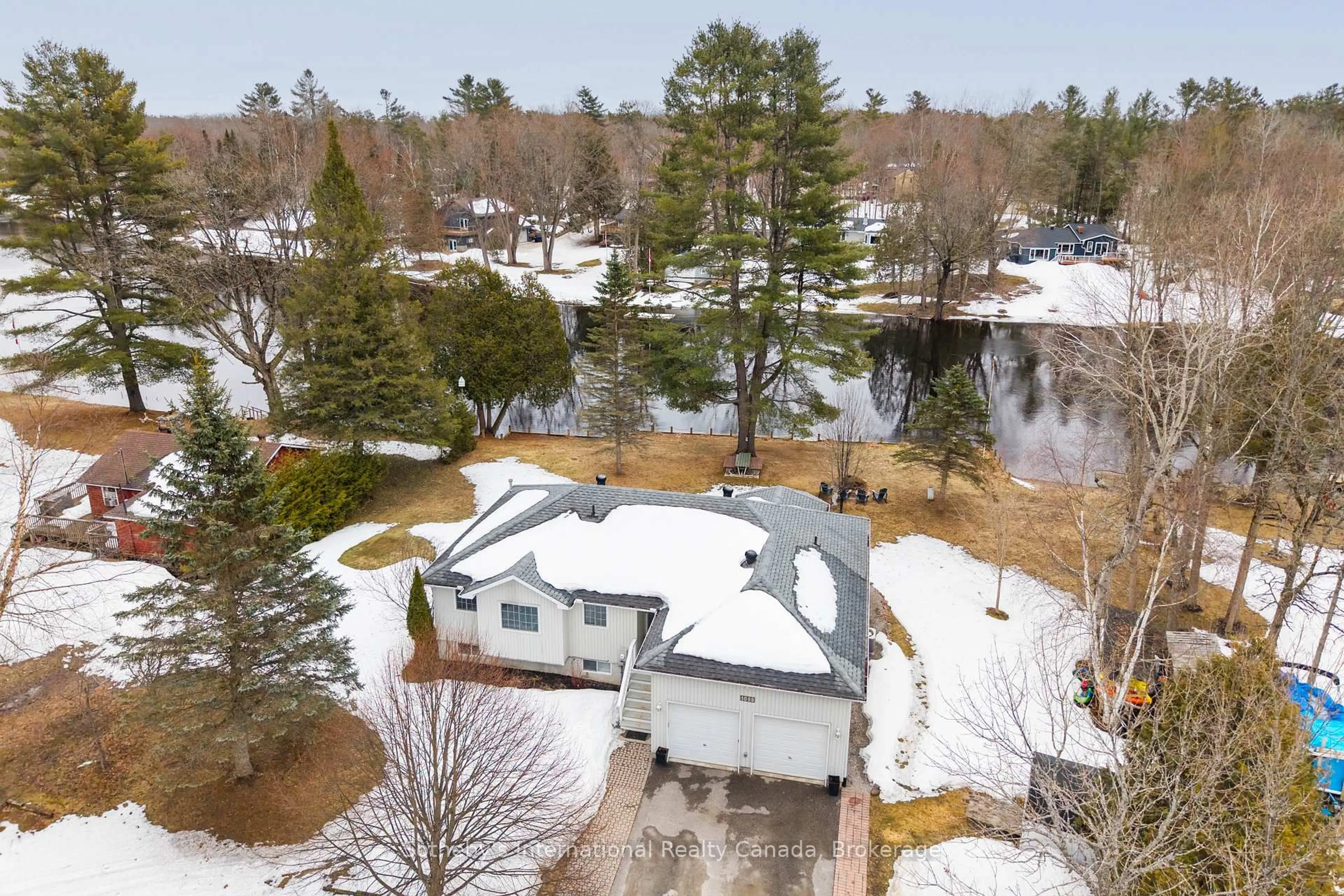A pic from outside/outdoor area/front of a property/back of a property/a pic from drone, water/lake/river/ocean view for 1099 Davis Dr, Gravenhurst Ontario P0E 1N0