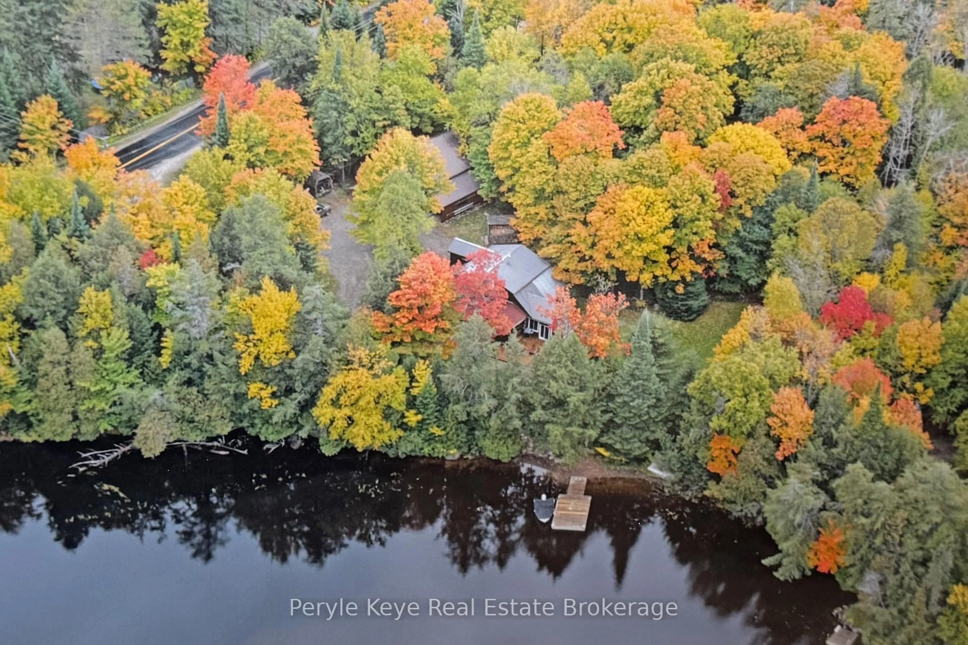 A pic from outside/outdoor area/front of a property/back of a property/a pic from drone, water/lake/river/ocean view for 2391 Limberlost Rd, Lake of Bays Ontario P1H 2J6
