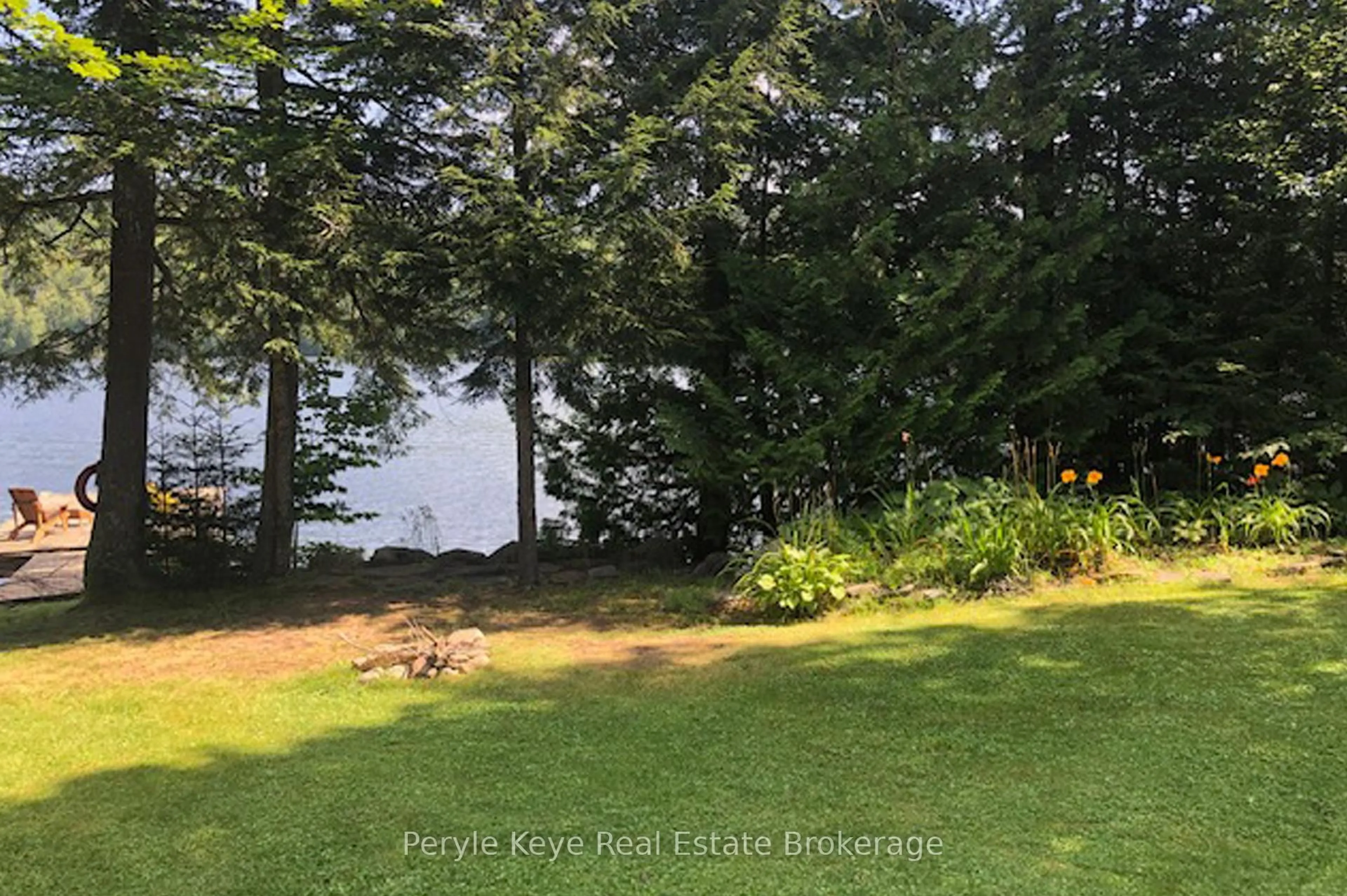 A pic from outside/outdoor area/front of a property/back of a property/a pic from drone, water/lake/river/ocean view for 2391 Limberlost Rd, Lake of Bays Ontario P1H 2J6