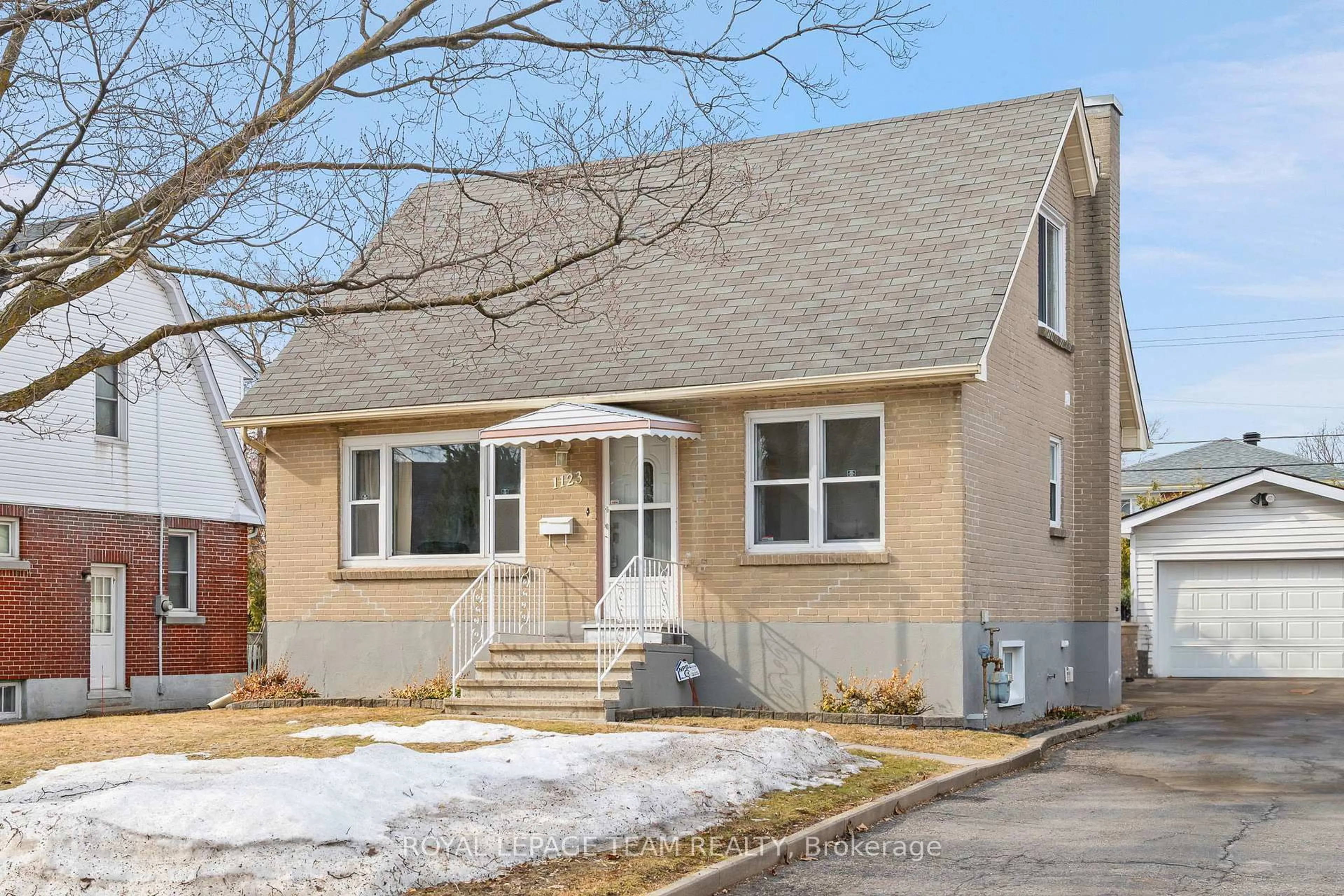 Home with brick exterior material, street for 1123 Secord Ave, Ottawa Ontario K1H 8C9
