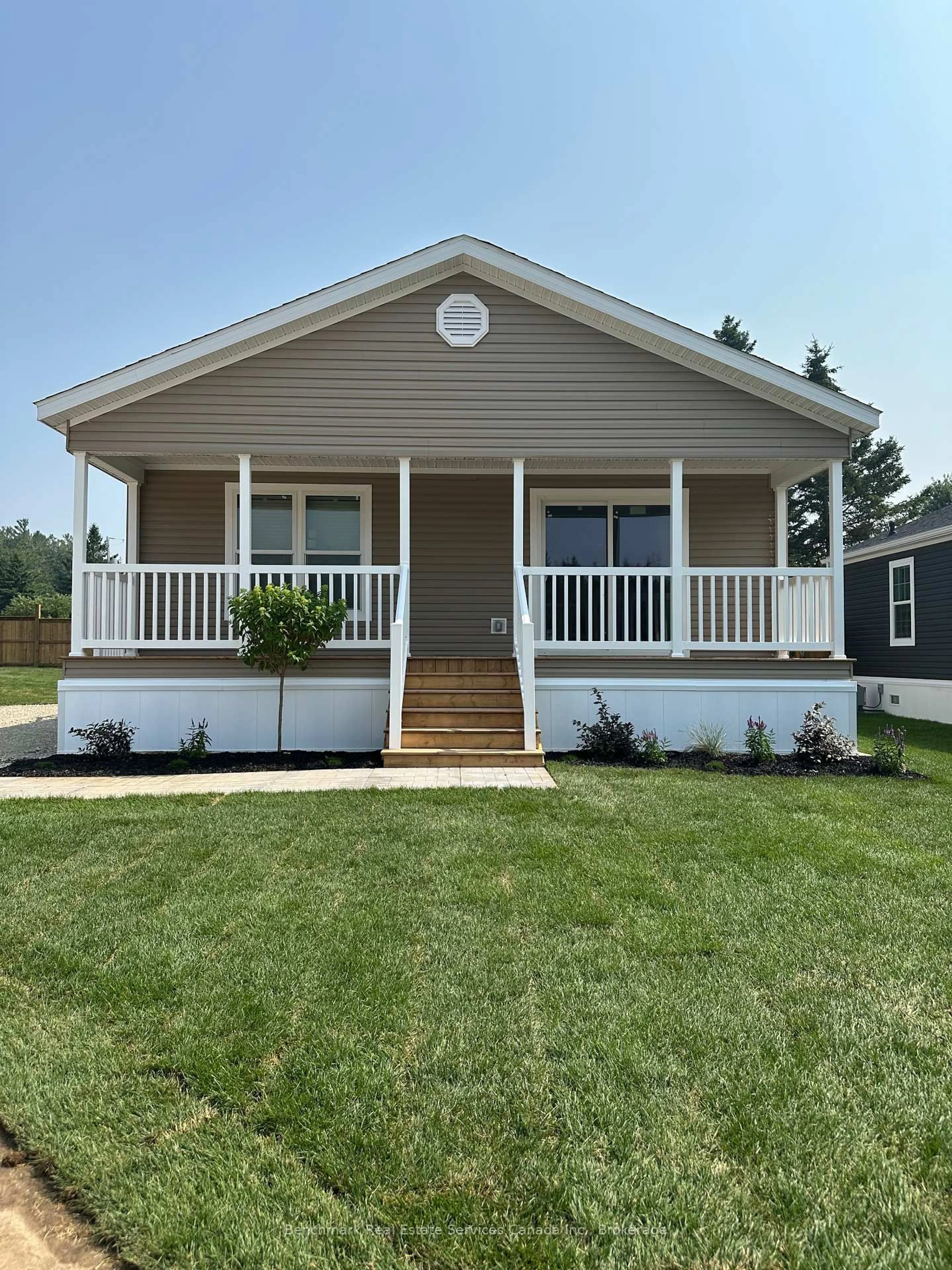 Home with vinyl exterior material, street for 210 Spruce Dr, West Grey Ontario N4N 3B8