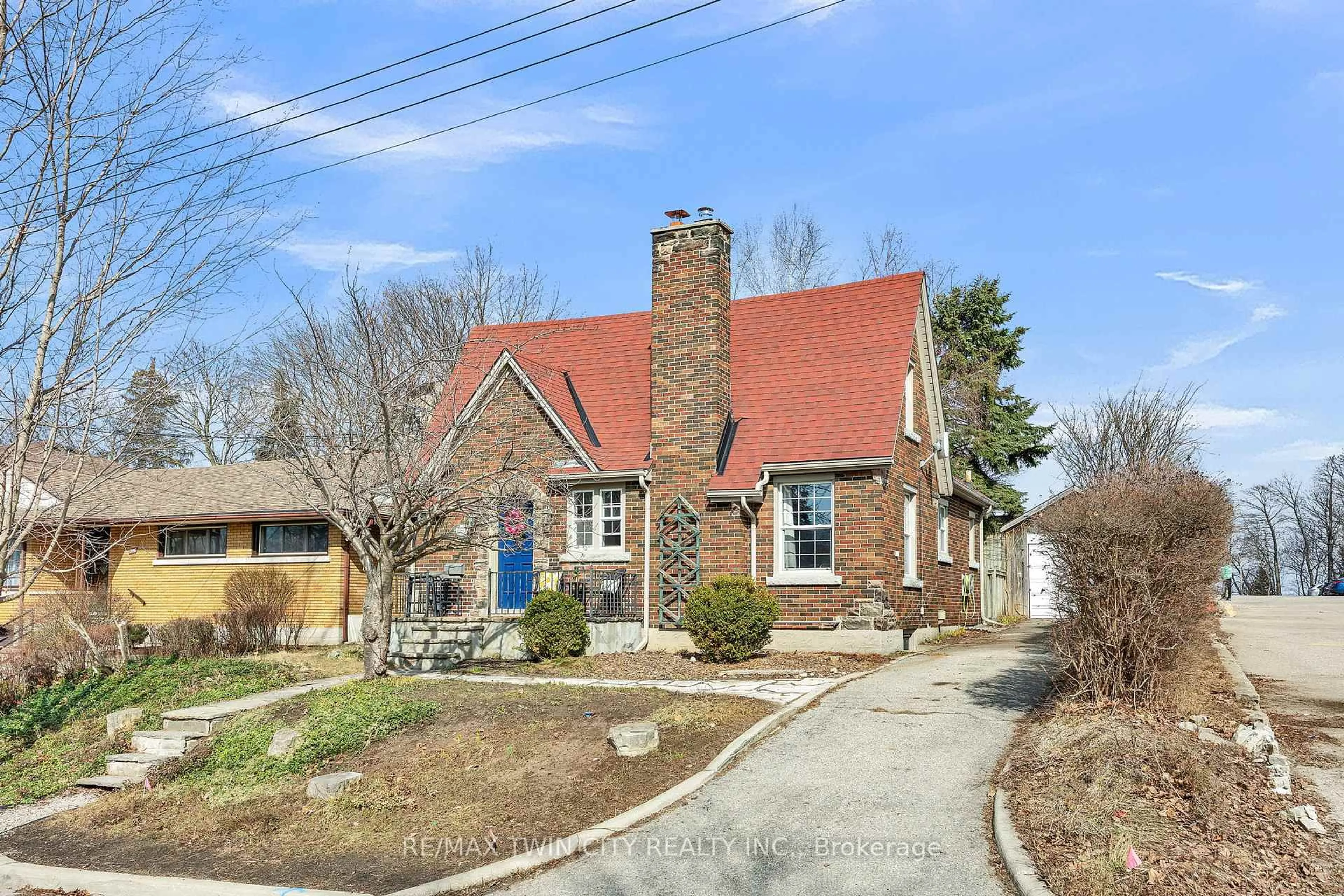 Home with brick exterior material, street for 360 Luella St, Kitchener Ontario N2H 2J4