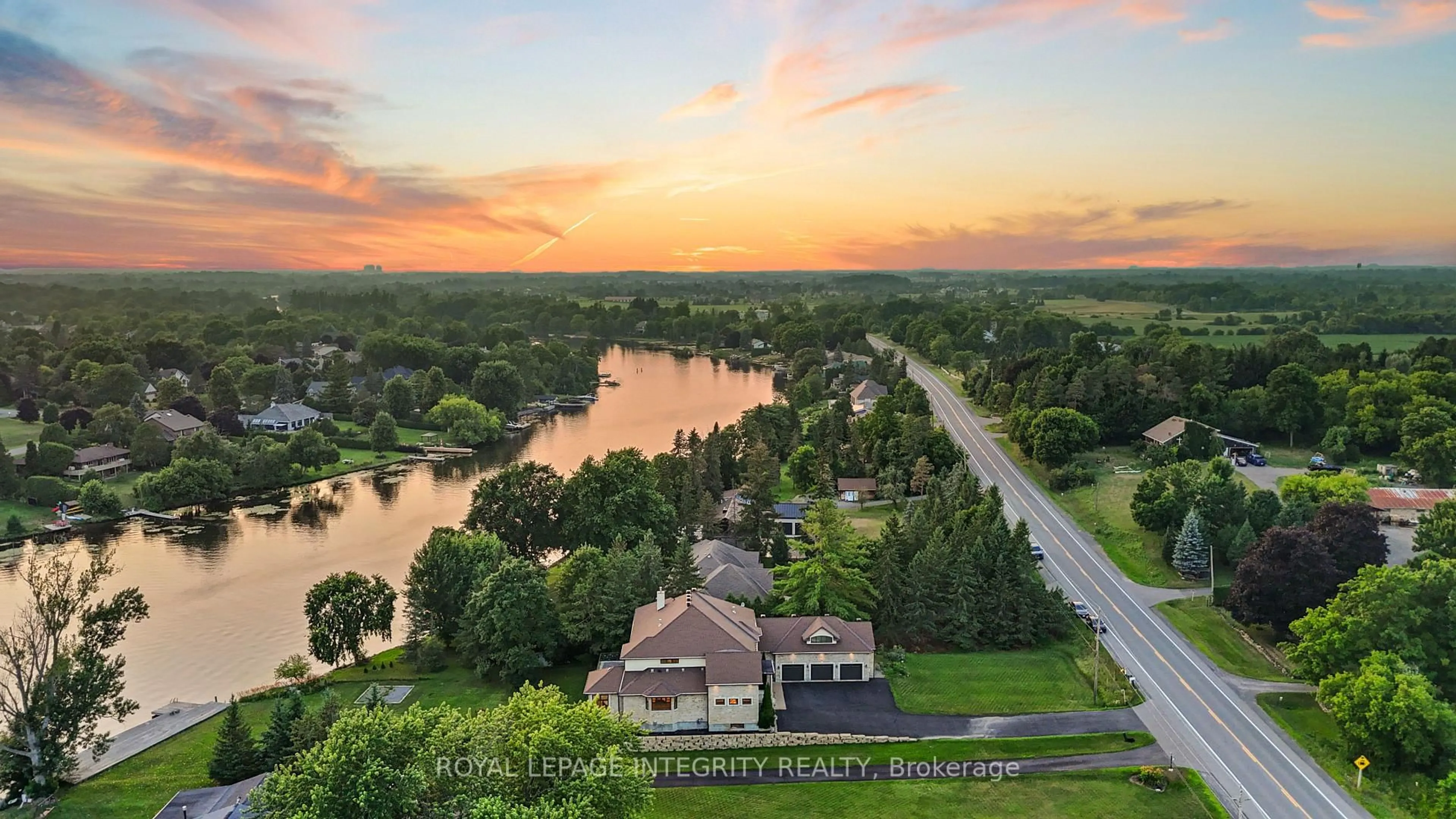 A pic from outside/outdoor area/front of a property/back of a property/a pic from drone, water/lake/river/ocean view for 1180 River Rd, Ottawa Ontario K4M 1B4