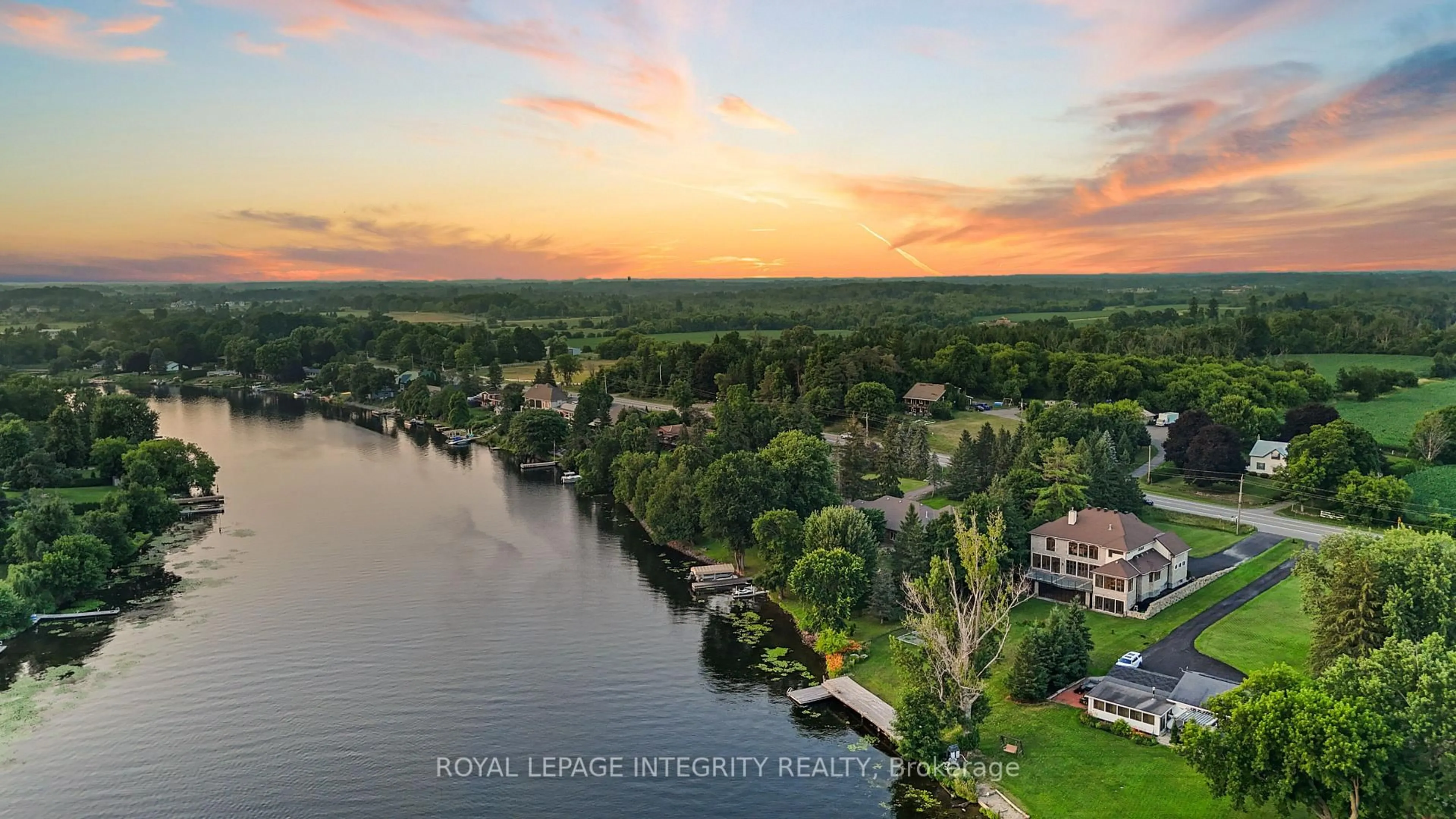 A pic from outside/outdoor area/front of a property/back of a property/a pic from drone, water/lake/river/ocean view for 1180 River Rd, Ottawa Ontario K4M 1B4