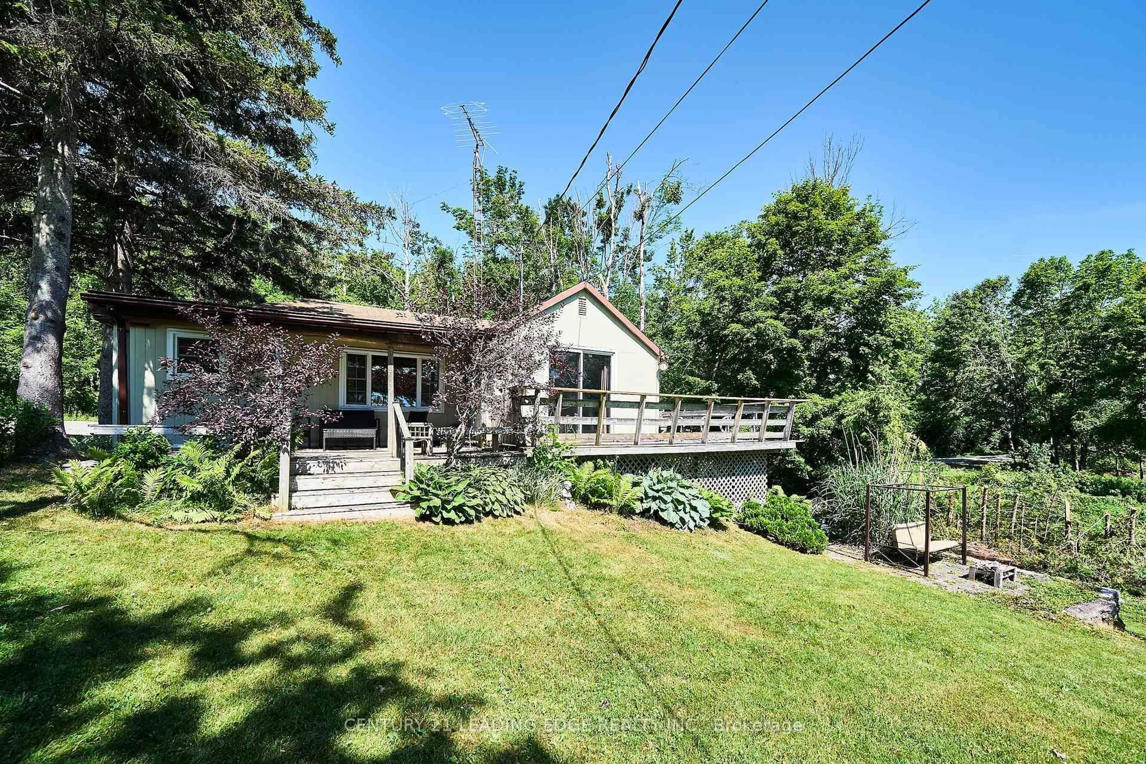 A pic from outside/outdoor area/front of a property/back of a property/a pic from drone, water/lake/river/ocean view for 225 Arnott Dr, Selwyn Ontario K0L 1T0