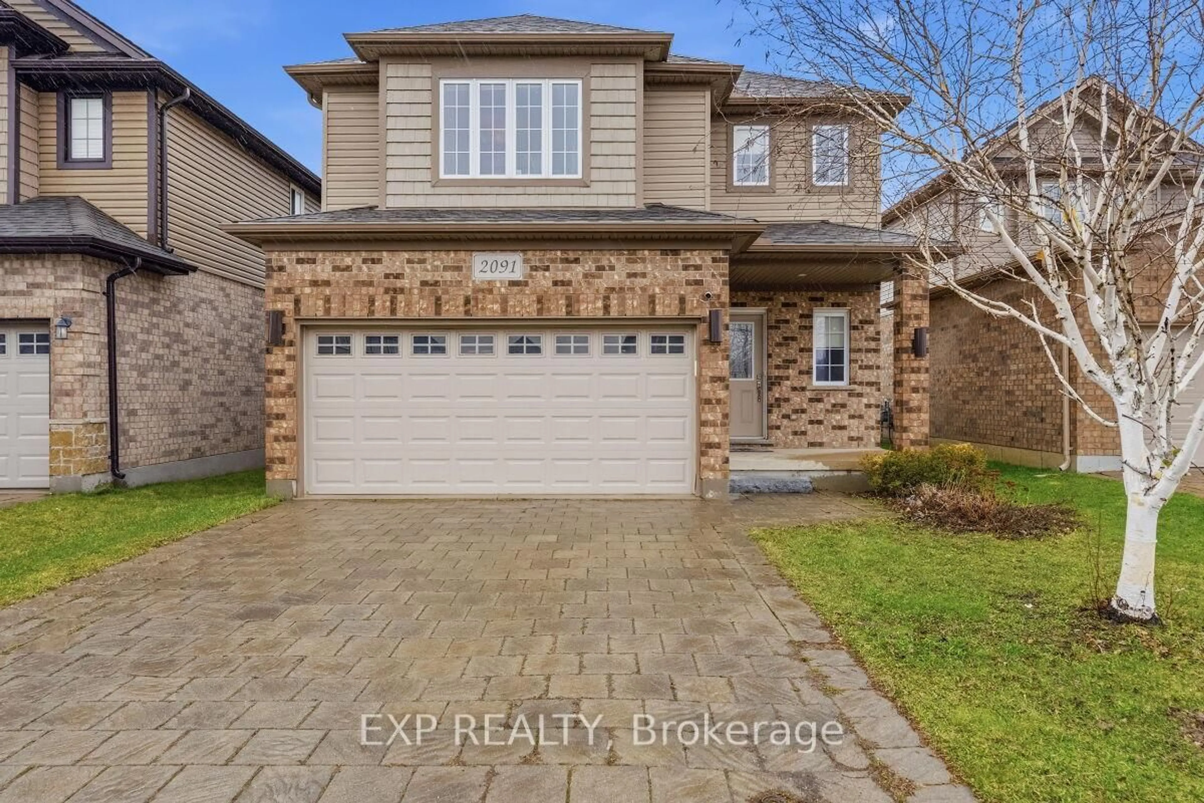 Home with brick exterior material, street for 2091 Cherrywood Tr, London North Ontario N6H 0C8