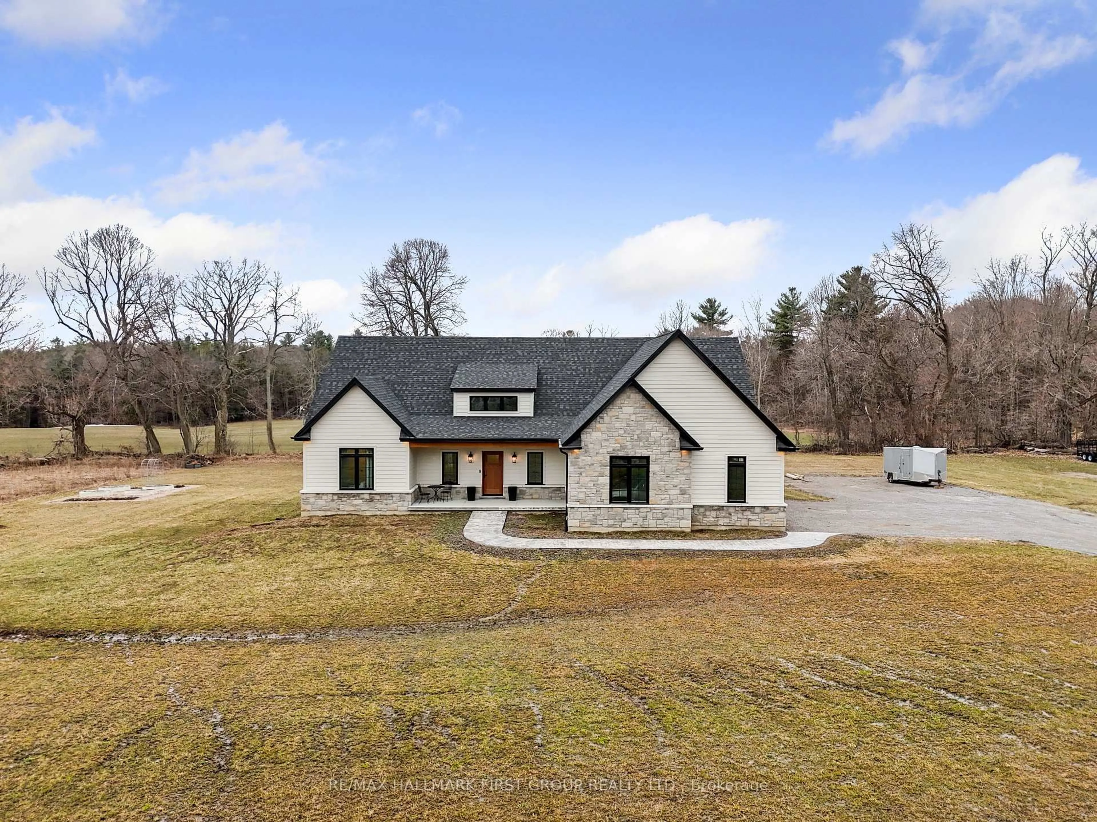 A pic from outside/outdoor area/front of a property/back of a property/a pic from drone, unknown for 3914 Kennedy Rd, Hamilton Township Ontario K9A 4J7