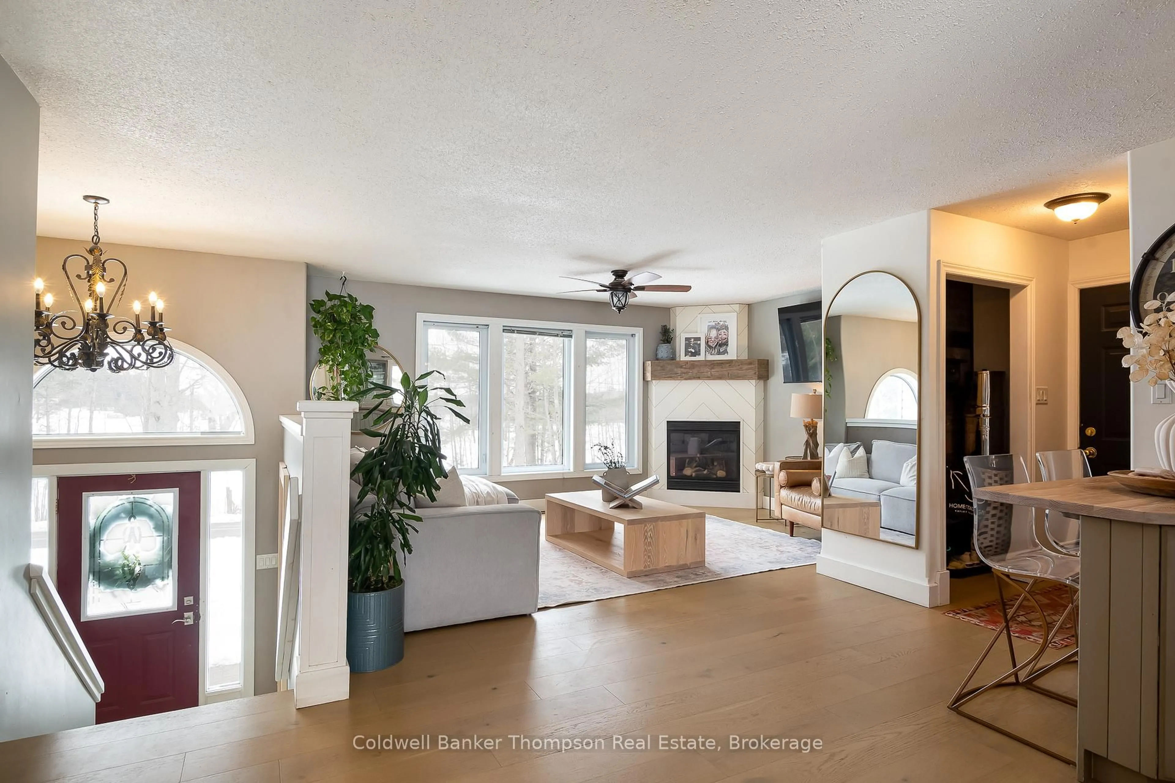 Living room with furniture, ceramic/tile floor for 791 Old Muskoka Rd, Huntsville Ontario P0B 1M0