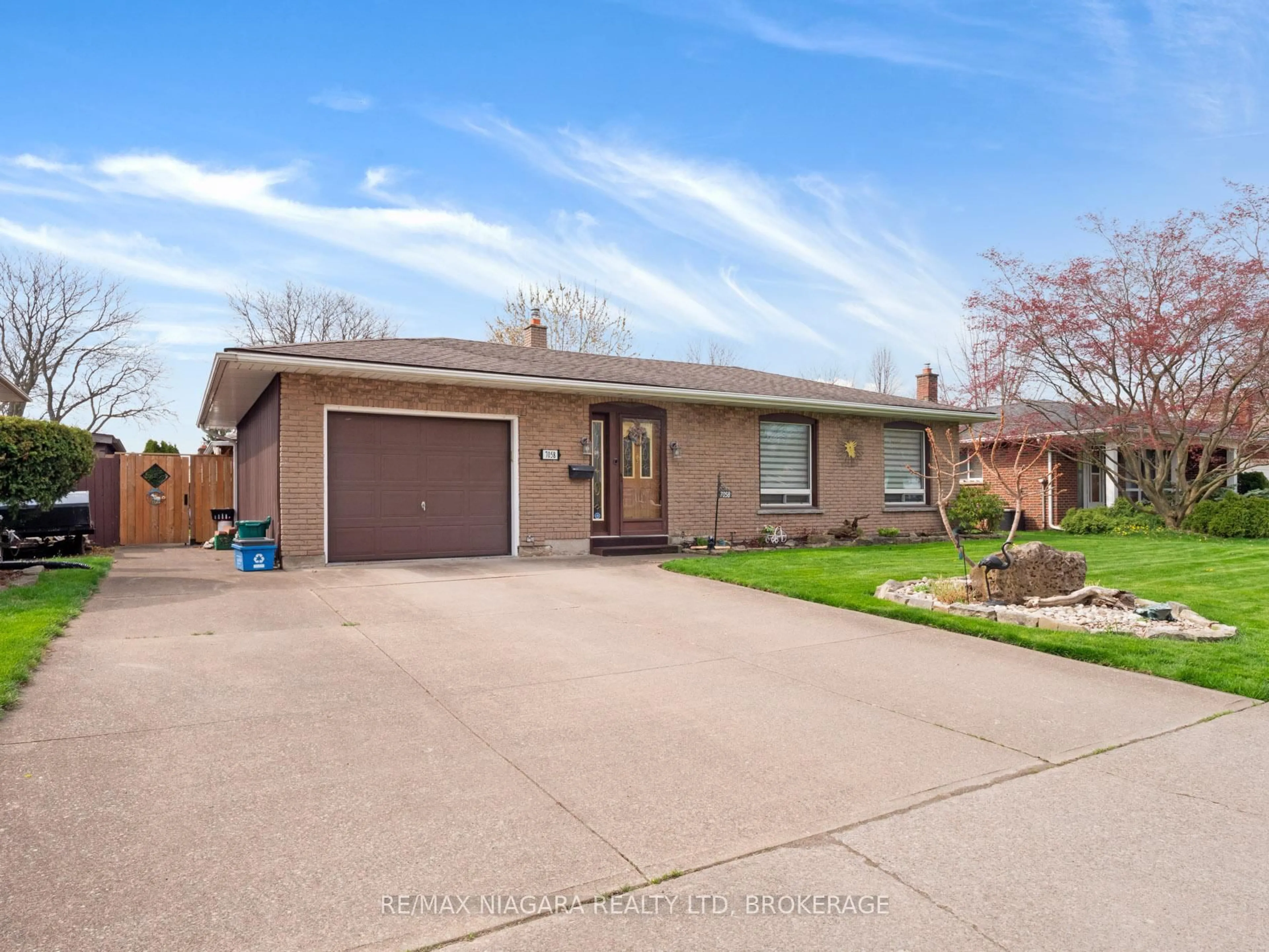 Home with brick exterior material, street for 7058 Freeman St, Niagara Falls Ontario L2E 5V5