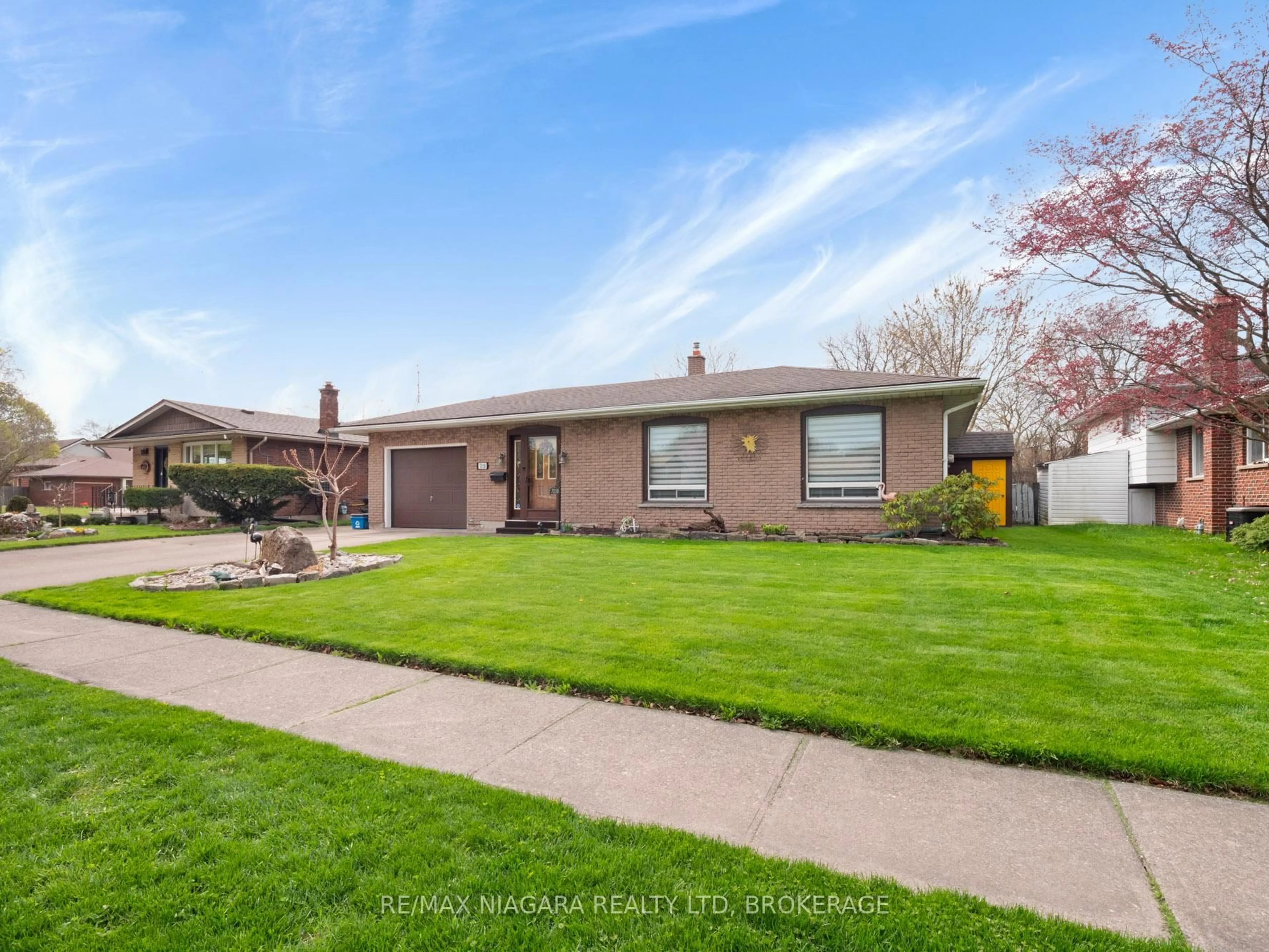 Home with brick exterior material, street for 7058 Freeman St, Niagara Falls Ontario L2E 5V5