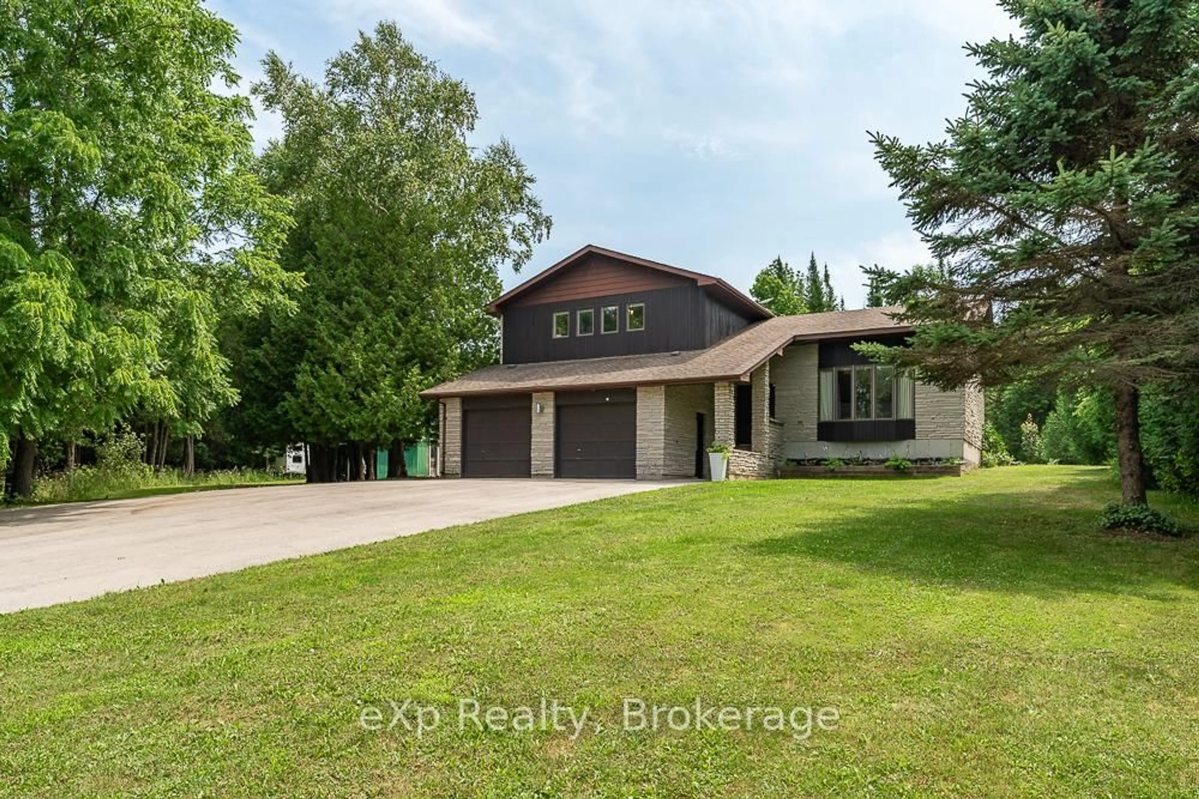 A pic from outside/outdoor area/front of a property/back of a property/a pic from drone, water/lake/river/ocean view for 502354 Grey Road 1 Rd, Georgian Bluffs Ontario N0H 2T0