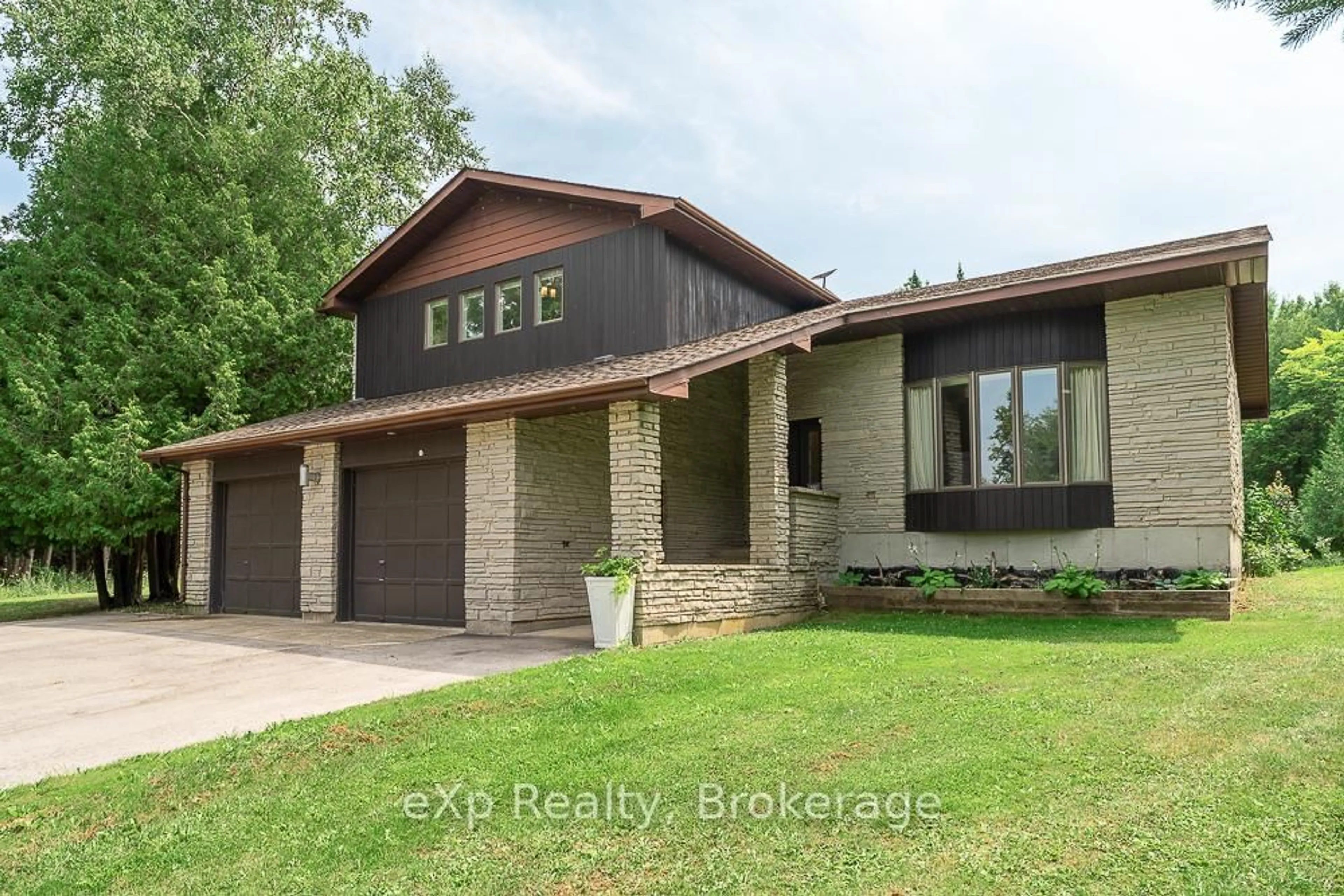 Home with brick exterior material, unknown for 502354 Grey Road 1 Rd, Georgian Bluffs Ontario N0H 2T0